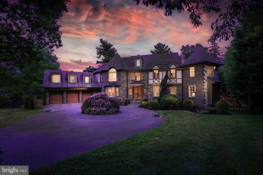 European Estate complete with pool set on over 3/4 acres on one of the most coveted streets on the Main Line. This 6 bed/6.5 bath home boasts almost 10,000 sf of living space. As you drive through the stone walled entry and through the gates to the circular drive the grandeur of the home is evident. The massive mahogany double doors enter into a two-story foyer that is flanked by a formal dining and living room with its own private deck and an adjacent private office surrounded with plenty of built-in shelving. The vast sunny and bright eat-in kitchen features inset cabinetry, double ovens, island seating, and 2 huge pantries. It is open to the family room where the stone fireplace is the focal point. A wall of windows and French doors allow sunlight to drench the kitchen and family room and offer access to the rear deck overlooking the tranquil rear grounds and heated pool with spa and slide. The 3-story mudroom addition provides plenty of storage as you enter from the 3-car garage offering laundry, pantry space, and a back staircase, and is plumbed for a bath should you desire. The second floor offers 5 spacious bedrooms with 9 foot ceiling height-the grand primary suite is a relaxing delight with tray ceiling, a separate sitting area, 3 walk-in closets, a spacious bath with whirlpool tub, walk-in steam shower and dual sinks. Three  en suite bedrooms, plus a 5th bedroom all of ample size and built in closets plus a huge 2nd laundry room with 2 full size washers and 2 dryers can be found on the second floor. The third floor offers another finished space with dormers for lots of light, a full bath and walk-in closet making a wonderful playroom or second office. The walk out lower level makes the perfect entertaining area with a bar, media area, game space, playroom, gym, 210-gallon salt water aquarium, plus a 6th bedroom suite with brand new full bath that also accesses the rear yard- perfect for entertaining or an in law. The yard is amazing- fully fenced, large level play area with pool separately fenced from play area.  Special features include a brand NEW cedar shake roof (2019), NEW gutters and downspouts, NEW generator, new fiber cement siding, 4 NEWER HVAC units, walk in cedar closet, central vacuum, level yard plus a 4 year young heated saltwater pool with hot tub and slide- over $600,000 in upgrades and mechanically sound! This luxurious estate is minutes to downtown Gladwyne, an array of parks, hiking trails, and Suburban Square, plus offers an easy commute to Center City- all in award winning Lower Merion School District.