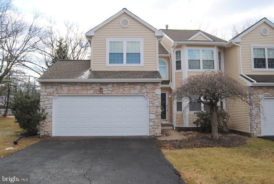 Beautiful End Unit Townhome in the desirable Community of Springhouse Woods in the Lower Gwynedd Township.  Two car attached garage. This end unit makes the house bright and sunny. This stunning house is updated throughout in & out. New roof (2023), window (2023), sidings (2023), all the bathrooms (2023), Deck (2023), brand new garage door (2024), and newer hardwood floor throughout the house including stairs. Freshly painted interior. First floor features two story Foyer, Powder Room, large Living Room with walk-in bay window, Kitchen with all brand new stainless steel appliances, granite countertops, ceramic tile floor & backsplashes, 5 burner gas range, microwave oven, deep sink, and Island opens to Family Room with gas fireplace, cathedral ceiling, skylights, recessed lighting, and sliders to maintenance-free trax deck,  and formal Dining Room. Second floor features huge double entry door main bedroom with recessed lighting, spacious walk-in closet w/organizer and full bathroom w/oversized tub & shower stall, and hall bathroom with beautiful ceramic floor & bathtub wall. Finished basement with plenty of storage space. The house is in very convenient location close to major roads, restaurants, train station, and shopping. Ready to move-in!