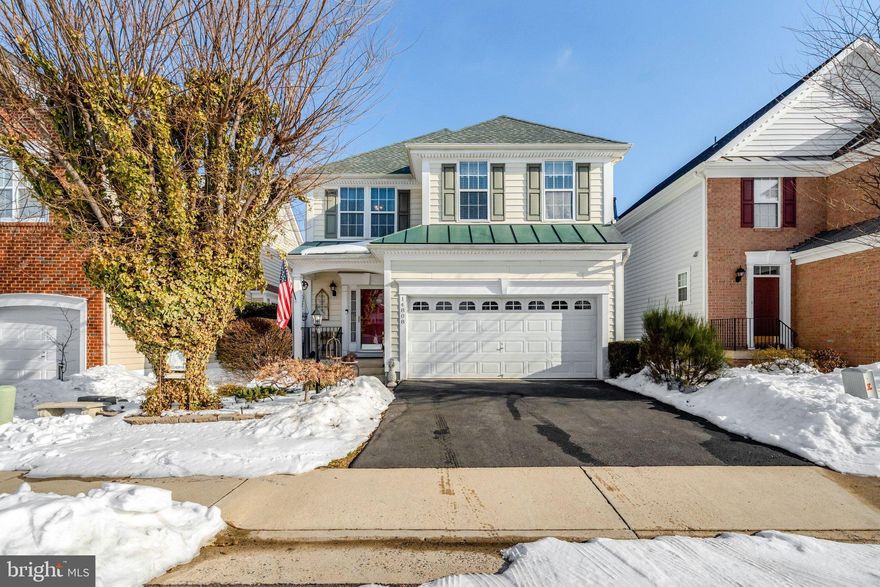 Wonderful single-family home located within the Town of Haymarket, offering easy access to shopping, dining, and everyday conveniences. Relax on the welcoming front porch before stepping into a thoughtfully designed main level featuring hardwood floors throughout, a gracious foyer, a formal living room with gas fireplace, and a formal dining room that opens to the gourmet kitchen.  The kitchen is well-appointed with stainless steel appliances, gas cooking, Quartz countertops, block glass windows surrounding the double stainless steel sink, a refrigerator with ice maker, microwave, dishwasher, and an eat-in breakfast area with walk-out access to the rear fenced yard—perfect for indoor-outdoor living. The upper level offers a spacious primary bedroom with vaulted ceiling and walk-in closet, along with a primary bath featuring a double sink vanity, separate soaking tub, and glass-enclosed shower. Three additional light-filled bedrooms, a full hall bath, and a convenient laundry room complete the upper level.  
The fully finished lower level provides a large recreation room with walk-up access to the rear yard, a bonus room ideal for an office or hobby space, a full bath, a separate utility room, and extra storage. 4 bedrooms, 3.5 baths, and a functional layout across three finished levels—this home truly has it all. A must-see!