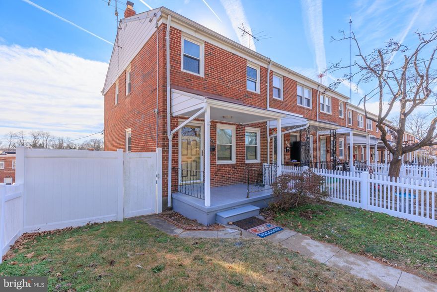 Welcome to 1449 Roland Heights Ave, nestled in Baltimore’s desirable Medfield neighborhood. This brick home offers a bright, inviting layout with tasteful updates throughout. The updated kitchen features white shaker cabinetry, granite countertops, stainless steel appliances, pendant lighting, and a breakfast bar that opens nicely for everyday living and entertaining. Enjoy beautiful hardwood floors and generous natural light in the living spaces. Upstairs, you’ll find **two spacious bedrooms** with hardwood flooring and great closet space. The updated full bathroom includes a granite-top vanity and a tiled shower with a sleek glass door. The finished lower level provides flexible bonus space—perfect for a family room, home office, gym, or movie room—and includes a **convenient half bathroom**, plus additional storage and walk-out convenience. Don’t miss the enclosed rear sunroom, an extra space to relax year-round. Conveniently located near parks, dining, shopping, and commuter routes—schedule your private tour today!