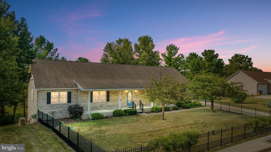 Welcome to the sought after neighborhood of Woodlawn Estates in Woodstock, VA!  Move-in ready! Whole house Generac generator!  12 ft ceilings in the basement!  2 car attached garage! Fully fenced in front yard!  Front porch with beautiful views! Rear deck!  Primary bedroom on main level! Come check out this 5 bedroom, 2 bath oversized, extended rancher with over 2700 sq ft of living space and potential in the basement for much, much more.  Great neighborhood to sit on the front porch or back deck drinking  your coffee.  The rear deck has a motorized awning with wind sensor.  Entering the home, you will see a living area on your right and then straight ahead is the dining room, kitchen, breakfast area, and the laundry room/mud room.  The kitchen features an island, large walk-in pantry and white cabinetry.  Down the hallway, you will pass a full bath, two bedrooms and then the primary suite which has a huge primary bathroom.  Walking down the stairs, you will see two more bedrooms, and two different unfinished spaces with so much potential for a theatre room, mancave, in-law suite, rental income or whatever suits your fancy.  There is also a built-in storm shelter room.  Four out of the five bedrooms in this home have walk-in closets.  With the whole house generator, you will never be left in the dark!  So close to the hospital, restaurants, gas, grocery stores,  interstate and so much more!  Set up your showing today!