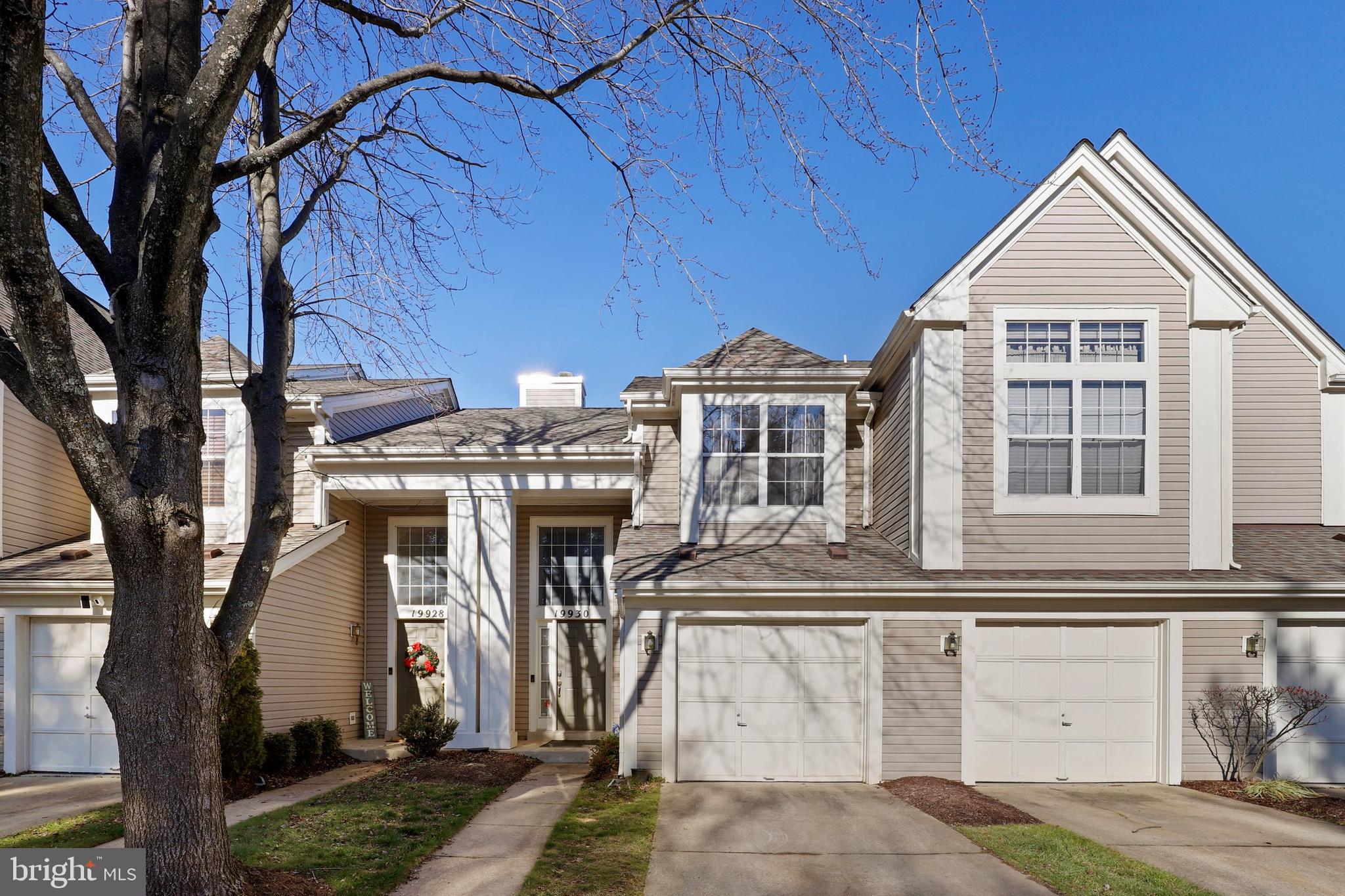 * * * OFFER DEADLINE TUESDAY, 01/05 @ 6:00 pm - PLEASE SUBMIT ALL OFFERS BY DEADLINE * * * Welcome home to this gorgeous 2 bedroom condominium with 2 fullbaths, 1 car garage and driveway! Enjoy the sun-lit 2 story foyer with wood-look, luxury vinyl tile that adorns the living/dining area and there's a lovely wood-burning fireplace with marble surround and hearth in the living room and a slider to the rear patio. Stainless steel appliances, ceramic tile floor and rows of windows for natural light in the kitchen, with new ceiling fans with lights, new bathroom faucets and 6 panel doors and updated flooring throughout. The primary bedroom features an en-suite bath and walk-in closet and new stacked washer and dryer on main level. Plenty of visitor parking and newer HWH (2 years). The condo fee covers roof, (replaced last year), chimney, trash/snow removal & common area maintenance. Minutes to Rt. 270 & 355, transit center, Marc rail & metrobus stops. Shopping, restaurants, Wegmans and movie theaters also close by.