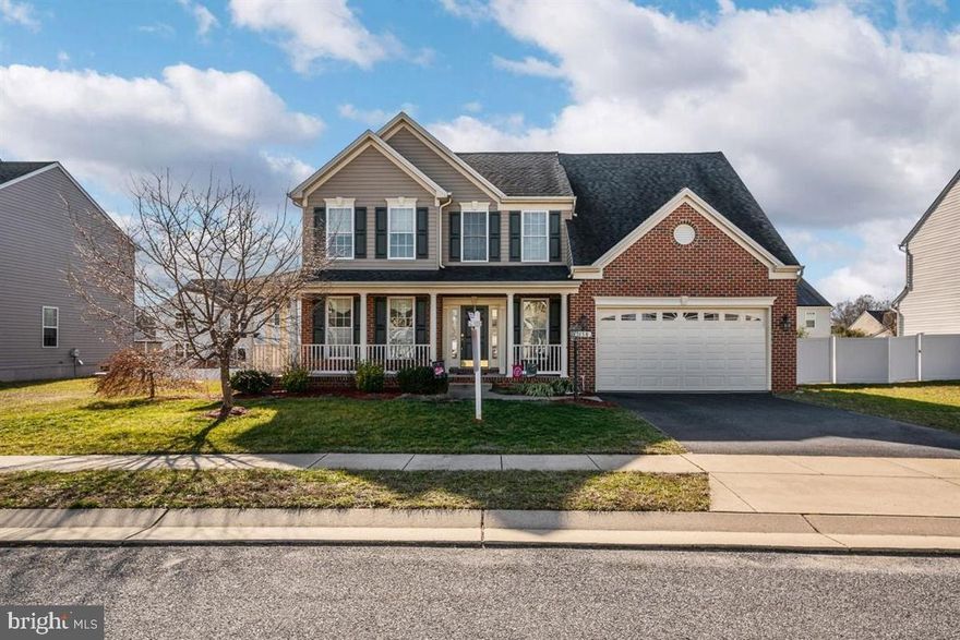 Welcome to the sought after Easton Model in North Brook. This is one of the BEST homes North Brook has to offer!!! This home is boasting over 3600 sq ft of true finished living space.  So many upgrades when this home was built, that you won't find another home in North Brook like it!  Freshly painted throughout and brand new carpet has been installed!! The Main level offers an open floor plan with living room, dining room, OVERSIZED family room, MASSIVE kitchen, and the rare office/playroom.  The OVERSIZED family Room offers a gas fireplace and all open to the GORGEOUS Kitchen with granite counter tops, large kitchen island, gas stove, large pantry and PLENTY of cabinet and counter space!!! There's even room for your kitchen table!! Heading upstairs you will find 4 MASSIVE bedrooms with AMPLE closet space. Storage is not a problem here!! The hallway full bathroom boasts double vanity, tile and tile shower. The Master is where you will want to be!! HUGE master bedroom with sitting area and a HUGE walk in closet!!! The master bathroom offers a raised double vanity, tile floors, soaking tub, and GORGEOUS tile shower. Moving downstairs to the finished basement you will find a living area, possible 5th bedroom, full bathroom and a walk out.  Moving back upstairs you have a GORGEOUS screened in porch with electric.  Enjoy your evenings out here!!!  The LARGE  yard is perfect for entertaining or just having fun!! Finishing off the home is central vac, brand new dryer, hardwood in the living room, dining room, and kitchen, 2 ft bump out in garage, and the gorgeous wrap around front porch.  The community offers a brand new playground, soccer field, pavilion, walking path, and ponds!! Conveniently located to all major routes, shopping and restaurants!! You can get to DC, Baltimore, Annapolis, Dover, the Beaches and Middletown with ease!!!