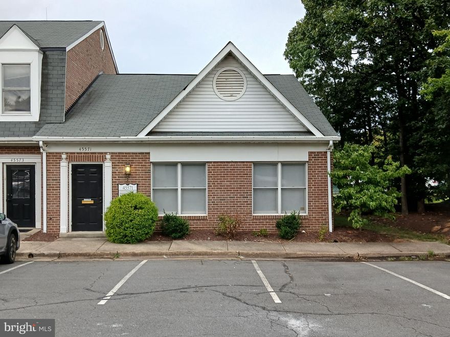 Ground level end unit office for sale in Sterling. It is currently being used as a combination office and showroom with a very modern design. It has two private offices in addition to the main open area. There is also a kitchen area and private restroom. The entire office is very well maintained and the HVAC was replaced less than two years ago.