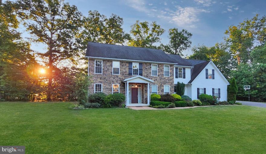 This CUSTOM-BUILT colonial-style home has an elegant and established presence, inviting you to appreciate the timeless architectural integrity of this LIKE-NEW HOME, completed in 2006. Each detail, from the carefully crafted woodwork to the graceful proportions of the rooms, tells a story of craftsmanship and enduring style. You will love the iconic high ceilings, custom carpentry, and large multi-paned windows that flood the home with natural light. 

This property is located in Lakewood, the region's premier lake community. Ask for the community website link for full details.

Upon entering the front portico of 103 Lakeside Loop, you are greeted with a spacious foyer showcasing a traditional staircase and CUSTOM MULTI-WIDTH HICKORY HARDWOOD FLOORS that carry throughout the home. French doors enclose private space to your right, perhaps for an office or playroom. To the left, you will find a LARGE (12x30) space suitable for a large formal dining room or additional sitting room. The kitchen is rightfully situated in the heart of the home, reflecting the charm of beadboard detail and the modern convenience of soft-close cabinets and contemporary appliances. The island is 9.5 feet long. This OPEN-CONCEPT space brings together a breakfast area with patio access, as well as a living room complete with a fireplace focal point and custom-hewn cherry mantle.

Upstairs, four bedrooms offer cozy retreats with fantastic closet space. The generous primary suite includes TWO LARGE WALK-IN CLOSETS. Down the hall, you will find a full bathroom equipped with two sinks and three bedrooms. An unfinished space behind the door at the end of the hallway provides ample storage or could be finished for an additional bedroom or living space. 

Other notable amenities include a side-entry two-car garage with stairs to a full unfinished basement, a main-level full bathroom, mudroom, laundry, and pantry closet. 

Call today to arrange your exclusive tour of 103 Lakeside Loop.