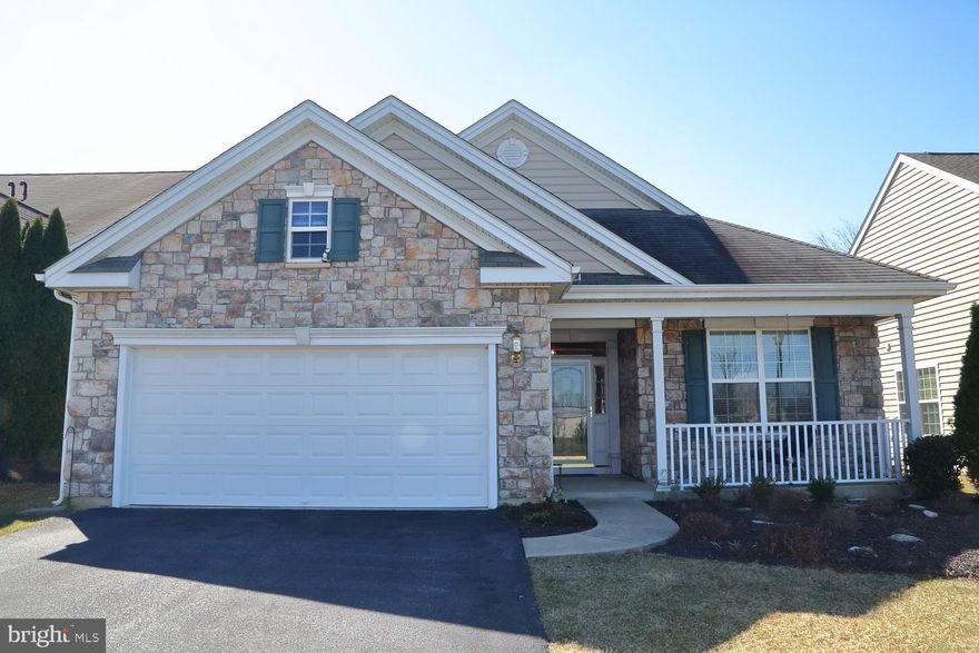 An incredible two bedroom, two bath home in desirable 55+ Four Seasons at Elm Tree overlooking a beautiful view of the pond! Enjoy carefree living with snow and lawn care provided by the Homeowner's Association with a featured lawn sprinkler system. A meticulously cared-for home with an open, flowing floor plan boasting 9ft ceilings, a very comfortable Living Room and a formal Dining Room and hardwood floors. The Kitchen has plenty of work space including 42" upper cabinets, pantry, glass top electric stove, new dishwasher, breakfast bar and breakfast nook open to the Family Room with a cozy gas fireplace. An added bonus is a Sunroom with vaulted ceiling and an extended Master Suite with a room 9' x 7' walk-in-closet adjoining to the Master Bath with ceramic tile floor and a double bowl vanity. Generously sized second bedroom has its own full, ceramic tile floor bath. Economical forced hot air/gas heat and gas water heater. it is a very short walk to the newly updated Clubhouse complete with a fitness room, meeting room, party room, billiards room, heated outdoor swimming pool, tennis courts, picnic area and an active community with various activities. Definitely a great place to live, come check it out!