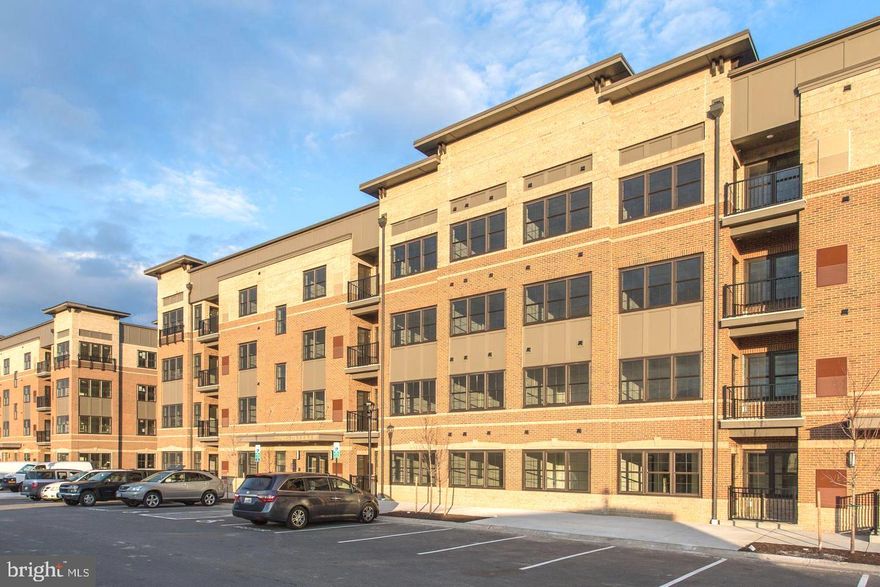 Luxury Biggest Unit at 2nd floor with a lots of Upgrade - almost 1700 square feet.  2 private garage parking spot 35, 36.  Bright Corner Unit - Hall of windows.  Lots of Sun with a private balcony.   Bright and Airy Living and Dining Room. Huge kitchen Island with quartz countertops. Upgraded stainless steel appliances,  Café 42" Cabinets with pantry, and so much, more! Wooden Floor living room and dining room, upgraded ceramic tiles in kitchen.  All upgraded bathrooms, super luxury Owner's baths, ceramic tiles. carpeting and padding in bedrooms. Ample Walk in Closet, Washer and Dryer in unit. Must see inside to appreciate! Quick Access to I66 and I495! Walking distance From Vienna METRO, and one stop from Dunn Loring METRO Station. A minute to Pam Am Shopping, Safeway...3 miles to Tyson's Corner Mall, mins to downtown Vienna.  Plenty of spaces in front with community tags. Mint Condition and it is ready for immediate move in ! Sentrilock Lockbox on the railing at the front door of the building. Thank you for showings! Please remove shoes or use shoe covers.  If you are not feeling well, please do not go in. Easy application - check the link to apply.  Please call LA for any questions.