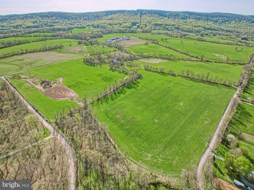 Wonderful opportunity to build your dream home or agricultural business on this 129 acre former dairy farm. This property offers western mountain views, rolling fields and over 111 acres designated as Prime Farmland according to the US Department of Agriculture.  Possibilities abound with the former dairy bankbarn, corncrib and farmhouse.  The property has been placed in a conservation easement with Old Dominion Land Conservancy as has have other farms in the area.  The easement does  allow for one division of at least 25 acres. Crops have been planted for this season...please DO NOT drive across any fields