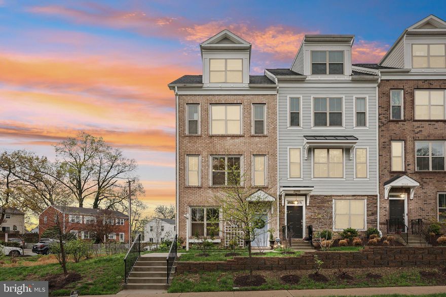 Experience sophisticated design in this beautifully upgraded four-level townhome in the sought-after Townes at South Glebe II. This home features thoughtful custom details throughout.
The entry level includes a versatile bedroom with a custom closet and queen Murphy bed, perfect as a home office or guest suite. An upgraded bath with a designer vanity and fixtures adds a touch of elegance.
On the main level, the open-concept living area showcases a gourmet kitchen with quartzite countertops, a bold hood range, and an oversized island. Designer pendant lights, custom built-ins framing the gas fireplace, and elegant tray ceilings enhance the space. Step onto the deck to enjoy your morning coffee or unwind in the evening.
Upstairs, the owner’s suite offers a spa-like bath, custom closet, and abundant natural light. An additional bedroom with an en-suite bath and custom storage provides a comfortable retreat for guests.
The top level serves as a private getaway with a bedroom, full bath, sitting area, and access to a second outdoor deck—ideal as a guest suite, office, or creative space.
A spacious garage with ceiling rack storage and a Rubbermaid FastTrack system keeps gear organized. Outside, professionally designed landscaping features hydrangeas and a charming window box.
Located in a welcoming community, this home is minutes from the Pentagon, Shirlington’s restaurants and shops, the W&OD Trail, parks, and the Army Navy Country Club.