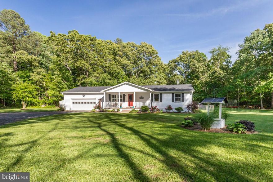 SERENITY IN HUNTINGTOWN! Situated on a 5.6 acre lot, this one level rambler has been completely redone, inside and out. Roof, siding, gutters, shutters, and entry doors have all been replaced within the past 2 +/- years.  As you enter through the front door, you will find the open floor plan featuring a great room, eating area, and the kitchen. New LVP flooring throughout. Upgraded lighting fixtures and ceiling fans. There is crown molding throughout as well. The kitchen has been tastefully redone with white cabinetry, stainless steel appliances, and granite countertops. The tile backsplash adds the perfect accent. The hallway leads to the primary bedroom with its ensuite primary bathroom. Off the hallway are the additional two bedrooms and the full hall bathroom. There is a separate laundry room off the kitchen on way to the 2-car garage.  Step outside through the new double doors onto the patio area and enjoy all the tranquility of country living. Backing to mature trees offering privacy and tranquility. There is a large fenced area in the backyard, as well as a chicken coup with its own fenced area.  No HOA so you can have chickens and goats if desired. The oversized shed provides storage for lawn equipment and tools. This home has been meticulously maintained and tastefully redone. Move-in ready! Schedule your showing today!