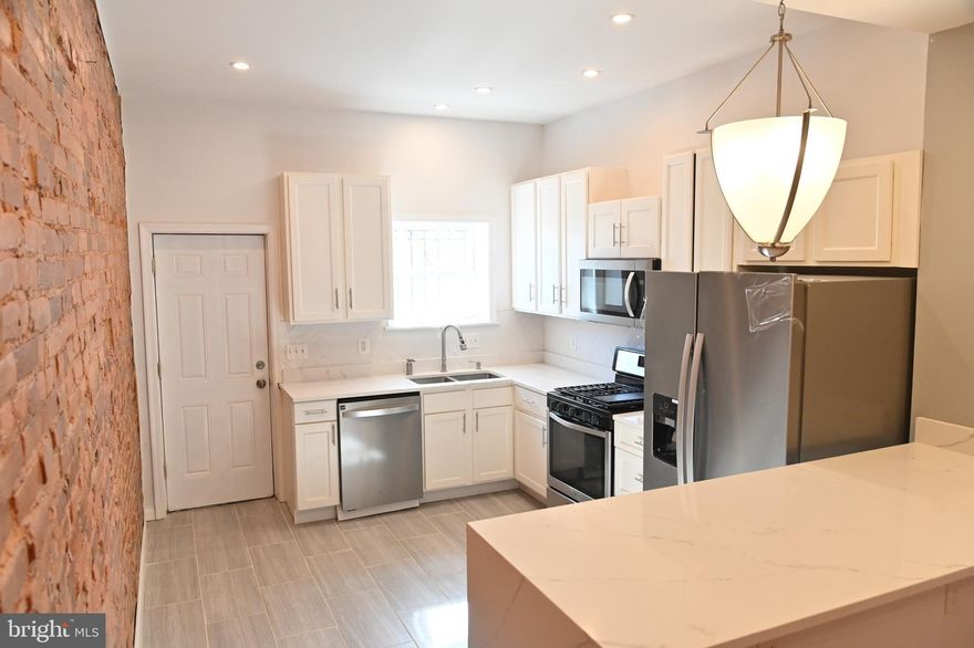 Thanks for showing
Fully Renovated and Reconstructed  Home With 5 Bed Rooms 3.5 Baths. Hardwood Floors in the Main, Second and Third Floors Carpet in Basement. Kitchen Fully Updated With New Stainless  Appliances, Granite Countertops, Stainless Refrigerator and dishwasher and Microwave Large Rooms,  Exposed  Brick Interiors Walls, New Windows, Nice Decks on First and  Third  Floors. 
A Must See. 
See Today and write Your Offer. 
MORE PICTURES COMING SOON
Good Luck