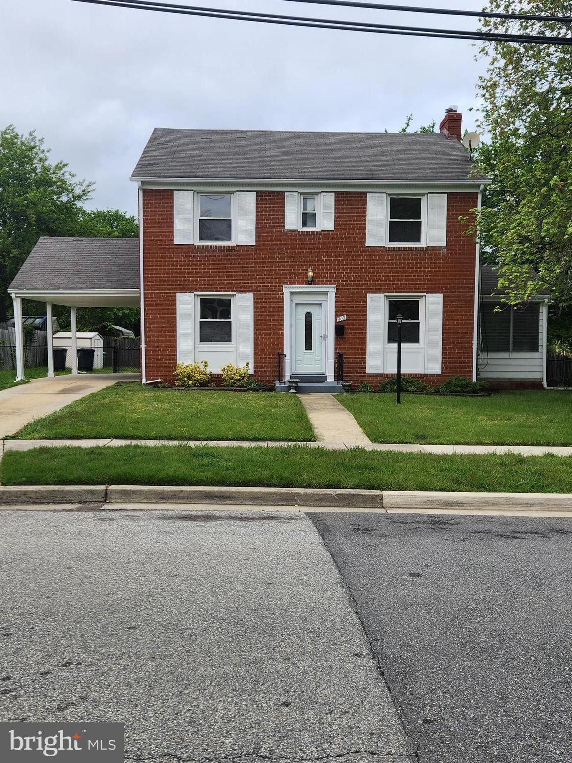 This is it. All brick home, with all the amenities. 4 Bedrooms, Hardwood Floors, Large separate dining room with crown and chair rail molding , large living room with fireplace and hardwood floors, full kitchen with granite countertops and custom kitchen cabinets and new stove, refrigerator, dishwasher, microwave, and new washer and dryer. Enclosed side porch. Fully finished basement with rec room and game room. Room for 5th bedroom. Nice corner lot with private rear fenced back yard, shed, carport and off street parking. Great curb appeal. Walking distance to Tangier shopping (outlet), MGM and National Harbor. New windows. Walk or bike to WW Bridge for exercise. Room for 5th bedroom. Seller willing to help with closing.