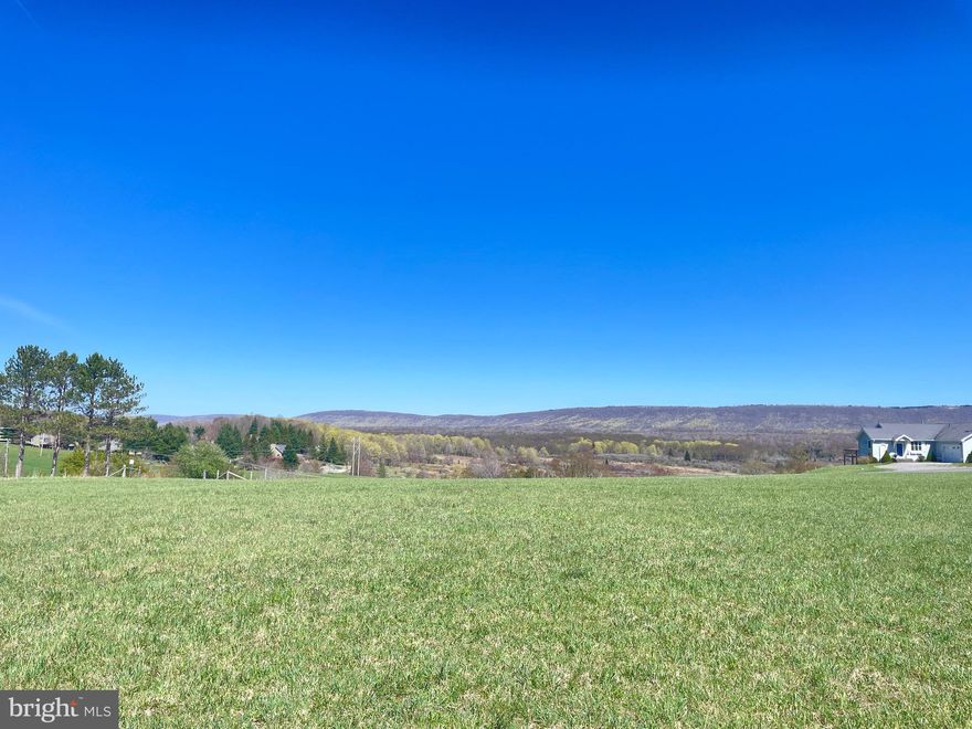 Buyer backed out. Phenomenal opportunity to purchase 14 unrestricted acres in Canaan Valley!  Dream home? Mini farm? Subdivision?  All possible here!   Great central location for quick trips to Davis or easy access to all the things you love in the valley.   Not only is this a beautiful piece of land, it will also be incredibly easy to develop.   Here are important things to know:  Access is via Cortland Rd.  The Right of Way (driveway) has been approved and the property has 591 ft of road frontage,   Property borders the Wildlife Refuge (730 ft).   No wetlands or unusable areas.  There is a gradual slope to the property and zero trees to clear.  Entire tract is mowed annually. Property was just surveyed in 2025. Great open views toward Canaan Heights, Mallow Lake and across the valley to Dolly Sods/Cabin Mountain,  Electric and natural gas are available at the property line.   Future homes will require well and septic. There is potential to divide into 6-7 residential lots.  This was once slated to be a future phase of the neighboring North Lake neighborhood.  No HOA.   Additional land available.   Agent/owner.  Happy to answer any questions!