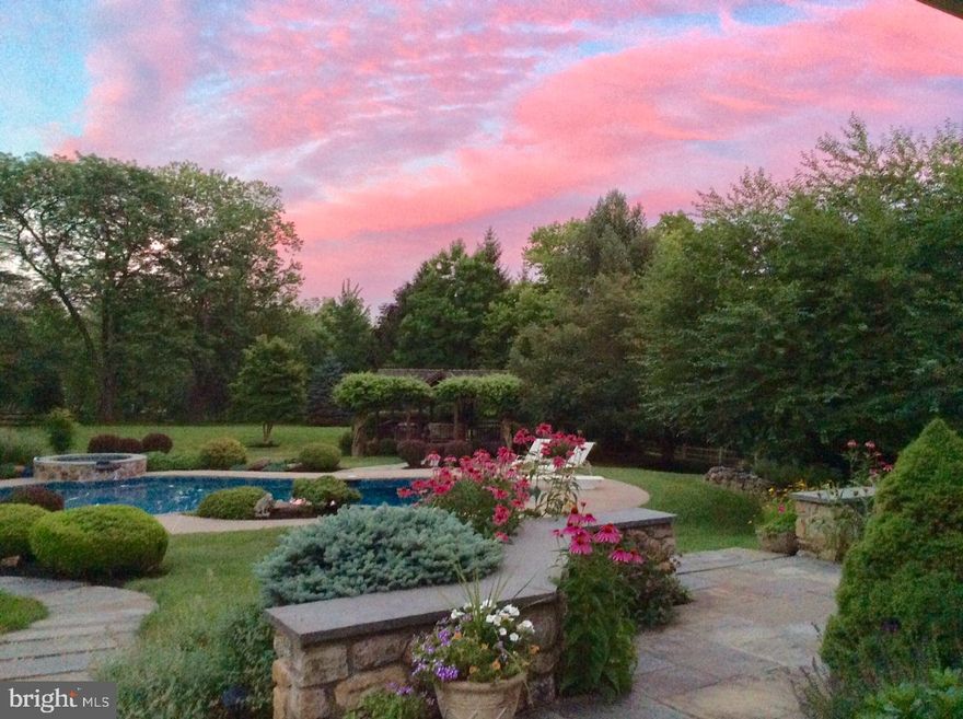 This gracious home is the epitome of understated Chester County elegance, combining the charm of a country farm house with a dramatic open floor plan. Custom-built by Lee Haller Jr and designed by renowned local architect Ann Capron to maximize the natural light and views of the beautiful Valley Forge Mountain setting, this home is aptly named, "Valley View."  Highlights include gorgeous hardwood floors, an elegant two-story entry with flagstone flooring, step-down living room with French doors, beamed-ceiling family room with a large stone (gas) fireplace, handsome paneled study, and a custom kitchen with skylights and a Portuguese-tile back-splash. The stunning sunroom overlooks the private, fenced 2.3 acre bucolic property, with a heated pool and spa with waterfall (pool and systems recently updated). There is a pool pavilion to relax in the shade on hot summer days, and a pool changing room. The field stone exterior is complimented by new low/no maintenance Hardie-Plank siding, and a newer architectural shingle roof.  Other updates include many new windows, newer, zoned-HVAC system, a whole house generator, main floor laundry/ mudroom, attached 3-car garage with inside entry, two main floor powder rooms (a third in the finished basement), an alarm system, and a partially finished basement plus unfinished storage.   Located  the desirable Tredyffrin-Easttown school district with easy access to public transportation and world-class shopping. This special property is shown by appointment only.  Make your appointment and you'll quickly see and appreciate all this lovely property has to offer.