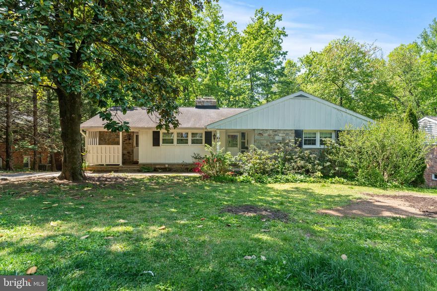 We kindly ask that All OFFERS BE SUBMITTED by 5:00 PM on Monday, May 5th for consideration. An exceptional opportunity for one level living has arrived. Traditional slate tiles welcome you into this expansive rancher that is perfectly nestled under a canopy of mature trees on a picturesque lot in the great 21228! Inside, you’ll find gleaming wood floors, fresh neutral paint, and brand-new carpet that make this home truly move-in ready. Two wood-burning fireplaces add cozy warmth and character to the living spaces. Indulge in the large eat-in kitchen featuring double ovens and plenty of workspace. Conveniently located next to the kitchen you will find the main level laundry with room to fluff, fold and store.  A sun-drenched four-season room opens to a spacious deck, seamlessly extending your living and entertaining space into the beautiful outdoors. The finished lower level offers a large entertaining area, two versatile additional rooms—perfect for a bedroom, office, playroom, or guest space—a full bath, and incredible storage options. Step outside to the patio and take in the peaceful natural surroundings, or work on your favorite project in the tandem garage. This is easy living. You deserve it, make your appointment today.
