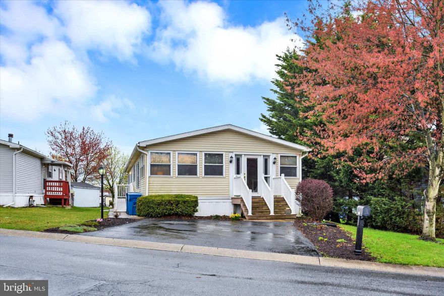 Country Manor Farms 55+ Community presents this well maintained doublewide ranch home  1st floor open  floor concept, Trex ramp, added bonus room with gas heater, walk in shower and lots of storage.  Extra bonus room could be used as a bedroom, sitting area or work space.  Stop and stay a while.  Close to shopping and medical  facilities.