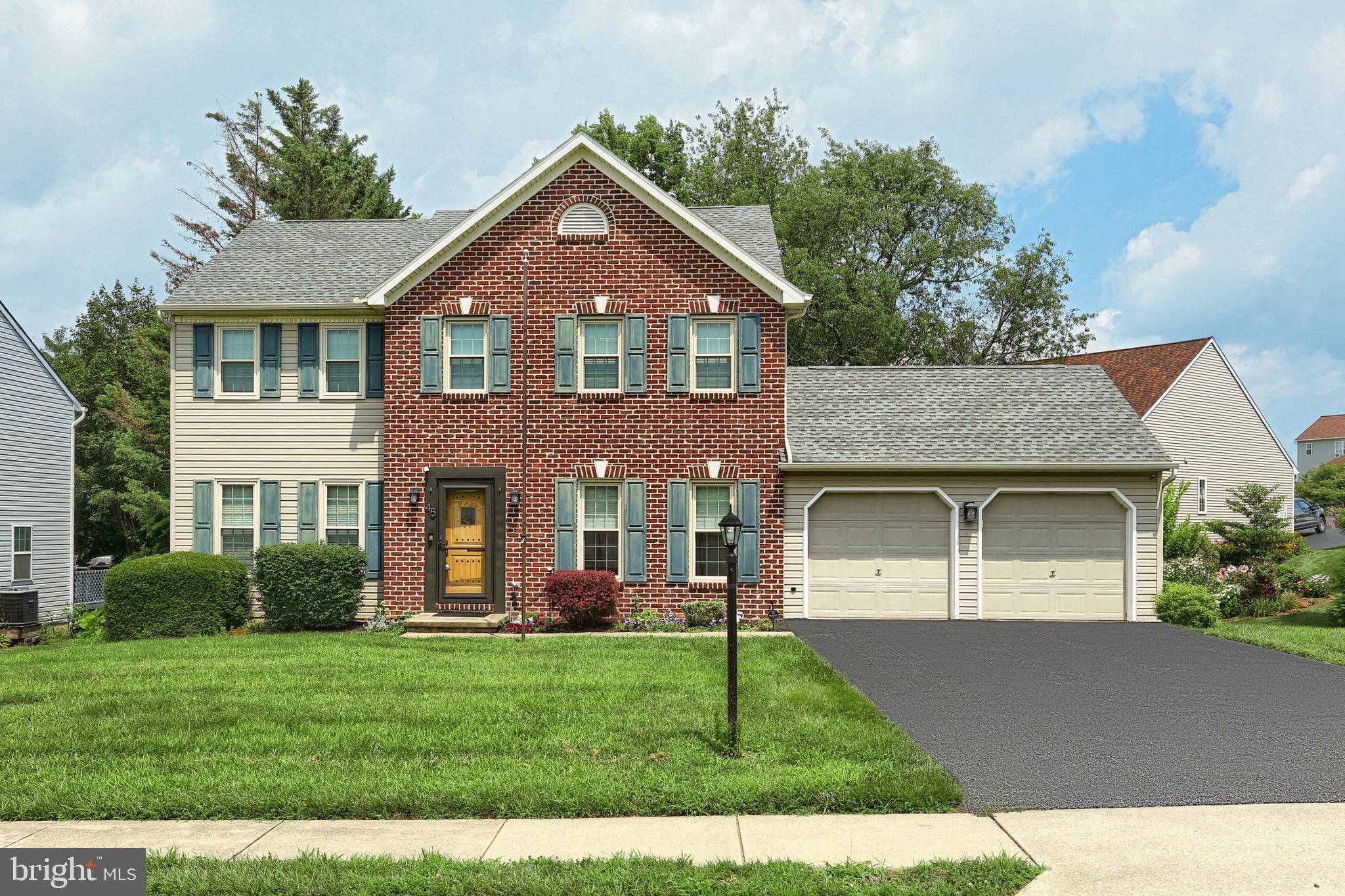 Welcome to 45 Buckingham Drive, a beautifully maintained 4-bedroom, 2.5-bath home nestled in the desirable Windsor Crossing community of Red Lion. This spacious residence offers the perfect blend of comfort and functionality, featuring a bright and open layout ideal for both everyday living and entertaining. The main level includes a generous kitchen and dining area that flows seamlessly into the living space, while upstairs you'll find four well-appointed bedrooms, including a spacious primary suite. The partially finished lower level provides flexible space for a home office, gym, or recreation room. Step outside to a private deck that overlooks a peaceful, tree-lined backdrop—perfect for morning coffee or evening relaxation. With a two-car garage, ample storage, and a location close to local schools, parks, and commuter routes, this home is a must-see.