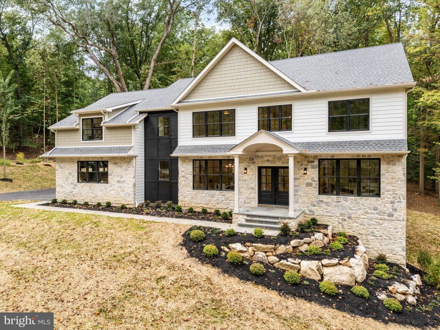 Welcome to 760 Old Eagle School Road, Wayne — a stunning new construction residence built by Rudloff Custom Builders where their main focus is crafting timeless designs with modern luxury.
Just under 5,000 square feet, this new construction 5-bedroom, 3.5-bath home offers luxury living with exquisite craftsmanship, countless builder upgrades, and custom finishes throughout. The exterior pairs classic stone with Hardie Plank siding, complemented by a slate walkway, slate patio, and extensive professional landscaping. Inside, white oak hardwood floors flow throughout an open and elegant floor plan. The heart of the home is a custom gourmet kitchen, outfitted with Thermador appliances, a large center island, bar area with mini beverage fridge, and walk-in pantry—perfect for both everyday living and entertaining. The kitchen opens to a breakfast room and spacious family room, anchored by a gas fireplace with custom millwork and built-in window benches. French doors reveal a private first-floor office, while a formal dining room and functional mudroom add convenience and versatility. Upstairs, the primary suite offers a serene retreat with a walk-in closet and spa-like bath featuring dual vanities, a glass shower, and soaking tub. Four additional bedrooms, a second-floor laundry room, and thoughtfully designed baths complete the private spaces. Additional highlights include a 3-car garage, custom millwork throughout, full unfinished daylight basement ready for your finishing touches, and a layout designed for both comfort and sophistication. This exceptional home combines luxury, function, and style—all in a prime Wayne location.