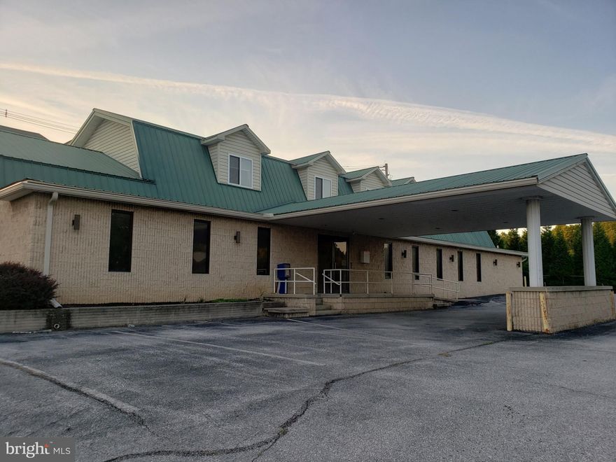 Great space in  prime location with endless opportunities offered now FOR SALE or NNN LEASE.   This very well maintained 5800 sq. feet building offers: lobby, reception area, multiple office spaces, conference rooms, kitchen, restrooms, extra rooms for storage, and 40+ paved parking spaces. Space can be easily modified to suit the occupant's needs and has a potential for creating an extra income if subleased.   Formerly used as business office and restaurant; can be also used for day care, medical office, retail, bank and more. Seller's financing available, call for more  information.