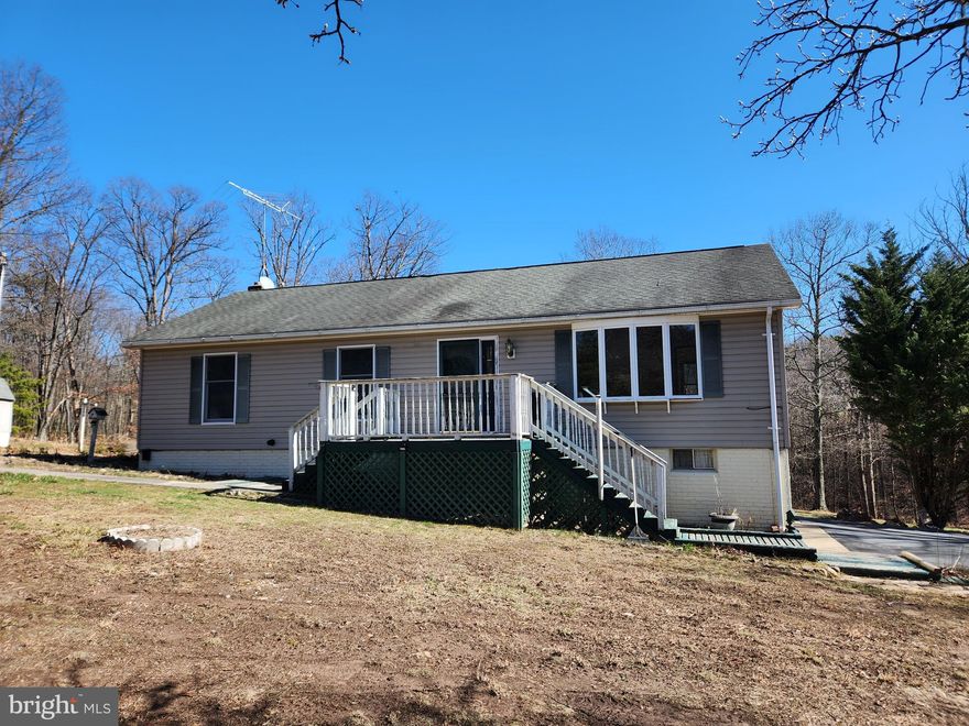 MULTIPLE OFFERS.  BEST AND FINAL OFFERS DUE AT 4:00 PM, April 4th.

This 2 acre unrestricted property has mountain views from the living room bay window!  You have so much room to spread out and enjoy the property with your family and friends and is spacious enough to host a back yard barbeque or till your own garden.  Partially finished basement with woodstove, laundry closet, electric wall heater and powder room.  The one car garage has a work bench and a small storage room with the water heater.  You're certain to find some peace and relaxation here listening to the stream next to the property.  Main level interior of home freshly painted!