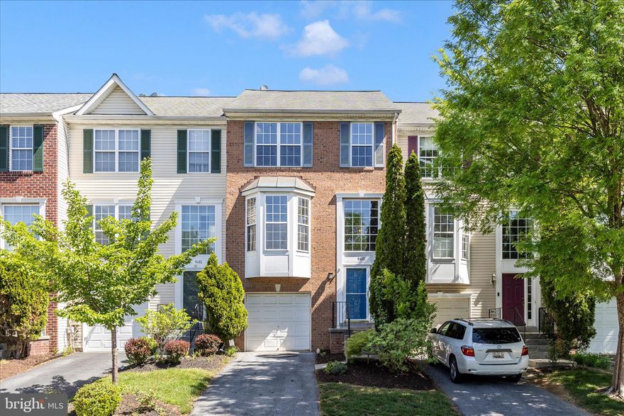 Welcome to 9410 Singleton Place in the highly sought-after Villages of Urbana, where thoughtful upgrades meet timeless charm and vibrant community living. This beautifully maintained Colonial-style townhouse offers over 2,300 square feet of well-designed living space, featuring 4 bedrooms, 2 full baths, and 2 half baths. The sellers have invested over $30,000 in recent improvements, making this home truly move-in ready. From the moment you enter, you’ll notice the professionally refinished hardwood oak flooring and fresh professional paint throughout, complemented by a desirable southwest-facing orientation that fills the home with abundant natural sunlight all day long. The upgraded kitchen features stylish granite countertops, a center island, and an eat-in area that flows seamlessly into the open floor plan, cozy dining room with a gas fireplace, perfect for both everyday living and entertaining. The lower level boasts brand-new wall-to-wall carpeting and recessed lighting in the walkout basement, offering exceptional flexibility as a fourth bedroom, home office, or game room. The primary suite provides a relaxing retreat with the view of mature trees from nearly every window, a large soaking tub, and walk-in closets. While the exterior showcases a charming brick front, bump-outs for added living space, and a deck ideal for outdoor gatherings. Step outside to a freshly hardscaped and ready-to-plant rear yard, fully fenced and designed to create a tranquil and private setting, perfect for relaxing or entertaining guests. Additional conveniences include an attached garage and driveway for ample parking. Located in the desirable Villages of Urbana, residents enjoy access to a wide range of amenities, including 3 swimming pools, a fitness center, sports fields, parks, walking trails, and several community centers, all while being close to top-rated schools, shopping, dining, and major commuter routes, RT 15, I-70, and I-270.