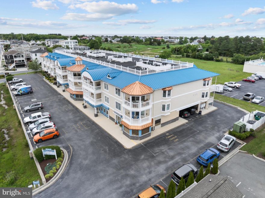 If you are currently working with an agent, please contact them to schedule a tour. If you do not have an agent, we can connect you with one who can assist you.   
Settle into effortless coastal living with ease in this spacious and well-appointed 2-bedroom, 2-bathroom end-unit condo, perfectly situated on the second floor and offering over 2,000 square feet of thoughtfully designed, single-level living. Nestled along the serene Lewes-Rehoboth Canal, this home provides a peaceful retreat just a short walk from the vibrant shops, restaurants, and beaches of Historic Downtown Lewes. From the moment you arrive, convenience and comfort take center stage. A private elevator offers direct access to your unit, while two designated parking spaces ensure hassle-free living. Step inside to find a bright and open floor plan, where a gas fireplace adds warmth and charm to the generous living space—perfect for quiet evenings or casual entertaining. 
The primary suite features an en-suite bath with a double vanity, soaking tub, and separate stall shower—creating a spa-like experience right at home. A second bedroom and full bath provide ideal accommodation for guests, a home office, or additional living flexibility. A dedicated laundry room adds further practicality to everyday life. Enjoy morning coffee or unwind at sunset on your private balcony, with tranquil water and marina views. As an end unit, this condo offers added privacy, natural light, and a calm atmosphere ideal for year-round living. Whether you're relocating, downsizing, or simply looking to enjoy the lifestyle Historic Downtown Lewes has to offer, this rare long-term rental combines the space of a single-family home (without the upkeep) with the ease of condo living—all in one of Delaware’s most sought-after locations. This condo checks every box so schedule a tour today and make this exceptional condo your next home!