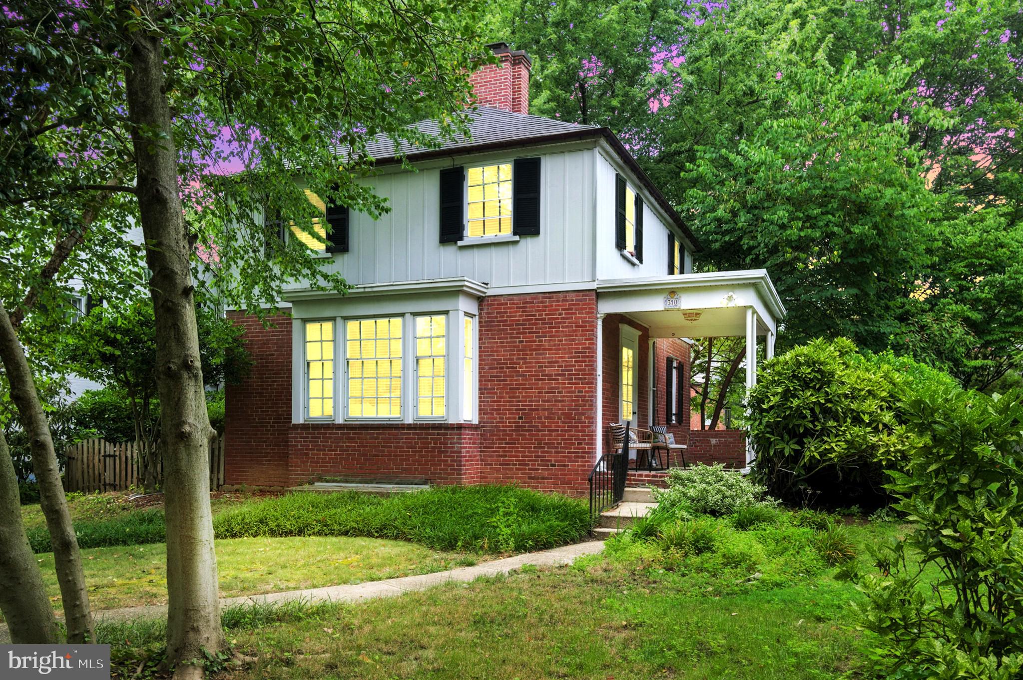 Welcome to this enchanting Colonial-style residence nestled in Historic Homeland, one of Baltimore's most desirable neighborhoods. Offering 4 bedrooms, 2 full baths and a generous 1,932 square feet of living space, this home effortlessly combines timeless elegance with modern conveniences. 310 Paddington Road boasts a large main level, flooded with an abundance of natural light, creating an inviting and uplifting atmosphere. From the moment you step inside you are greeted with beautiful hardwood flooring that carries throughout the main and upper levels, forging a warm and inviting ambiance. The rich, natural tones complement any decor style, offering a seamless blend of sophistication and practicality. The kitchen is sleek and stylish with white cabinetry and black granite counters, breakfast bar, newer dishwasher and gas range. On the upper level you will find a full bath with the same sleek and classic black and white theme, along with 3 large bedrooms. The lower level has been fully finished with a full bath and 4th bedroom, with egress window, just added in 2024. The family room with a second decorative fireplace provides a versatile area for relaxation, entertainment, work space or recreation, allowing you to tailor the space to suit your lifestyle. The luxury vinyl plank flooring throughout ensures durability and easy maintenance, making it an ideal choice for busy households. This home boasts a sprawling, fenced-in backyard oasis, offering a serene escape from the hustle and bustle of everyday life. The large backyard provides ample space for outdoor entertaining, gardening, play or simply unwinding in the fresh air. Whether you envision hosting al fresco gatherings, creating a lush garden sanctuary, or installing a custom outdoor living area, the possibilities are endless in this idyllic setting. Walk along the stone path to your private one-car garage with new door (2024). Over $70,000 of updates have been made to this home, including a new slate roof (2020-2023), copper gutters (2023), repointed chimney with custom copper cap (2021), clothes washer (2021), hot water heater (2023) dishwasher (2023), fencing (2023). Discover the perfect blend of traditional charm and modern amenities at 310 Paddington Road—a true gem in one of Baltimore's premiere neighborhoods. Don't miss this opportunity to make it your own.