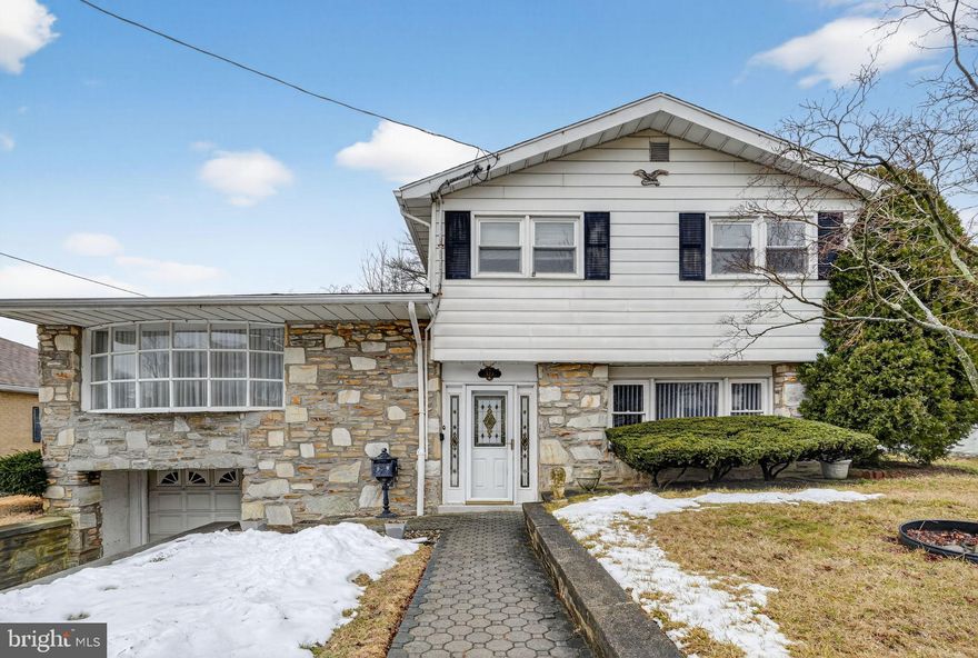Spacious three bedroom split level. located on very nice street in upper Roxborough.  It features a huge family room, large living room, formal dining room and a nice kitchen.  Upstairs, we have three spacious bedrooms and a full bath.  The basement is unfinished, with a powder room.  Out back, we have level yard almost the size of Texas!!!  FEEL FREE TO STOP BY FOR AN OPEN HOUSE ON SATURDAY FROM 1:OO-3:OOPM!!!
