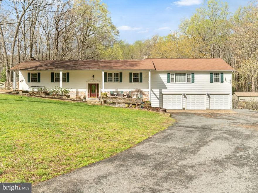 Very unique property with a lot to offer including NO HOA! Nestled on 1.6 acres and backing to trees makes you feel completed secluded, yet you are still a short distance from Quantico, I95 and shopping. If you are a car lover or need a separate workshop the additional 2 car detached garage is perfect for endless projects. The home offers a traditional layout except for the additional apartment space above the garage with a full kitchen, bedroom, separate living area and full bathroom, adding an additional 1,080 finished sqft. Ideal for a rental space, in laws or the college student that is now attending virtual. The area includes 2 separate entry access. Your evenings can be enjoyed on the generously sized screened in deck, or on the front porch by the coy pond. The options are endless.