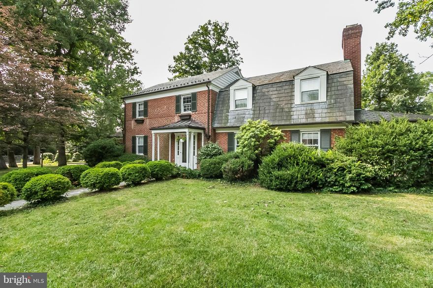 Great location! All brick 3 BR 2/2 Ba colonial home on a beautiful .71 acre lot. Open 1st floor plan with foyer opening into the spacious LR w/FP. Dining room opens to gourmet kitchen with SS, granite & Brazilian soapstone. Hardwood flooring throughout, flagstone patio, lovely covered side porch & very large fenced rear yard. Partially finished basement & attached garage.