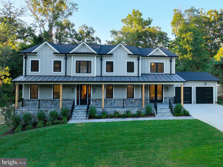 Spectacular New Construction Home in Alexandria City – Over 7,000 Sq Ft of Refined Living. Welcome to this exceptional new construction home, nestled on a rare .46-acre lot in the highly sought-after Malvern Hill/Sterling neighborhood of Alexandria City. This stunning residence offers more than 7,000 square feet of meticulously designed living space across three finished levels, featuring 6 bedrooms, 5 full baths, 2 half baths, and an oversized two-car garage—the perfect blend of thoughtful luxury and everyday functionality. As you arrive, the home’s striking exterior impresses with a sophisticated blend of natural stone and Hardiplank siding, accented by sleek window frames and high-end gutters. A covered front porch welcomes you into the light-filled foyer, where expansive windows and gleaming white oak floors create an inviting first impression. To the right, a spacious formal dining room comfortably seats 8–10 guests, ideal for gatherings and celebrations. To the left, a private home office offers the perfect space for remote work or quiet study, featuring elegant finishes and ample natural light. The open-concept layout flows into the heart of the home: a gourmet chef’s kitchen with an oversized island and breakfast bar, custom shaker cabinetry, quartz countertops, designer pendant lighting, and stainless steel appliances including a gas cooktop. A sunny breakfast area leads to the expansive family room, anchored by a beautiful marble-surround gas fireplace. French doors open from the family room to a generous Trex deck with integrated outdoor lighting—perfect for al fresco dining and entertaining—overlooking a private, tree-lined backyard that offers a peaceful retreat. The main level also includes a stylish powder room and a well-equipped mudroom with full-size washer and dryer, shaker cabinets, built-in bench with hooks, sink with disposal, and a glass rear entry door for easy access. A spacious main-level in-law suite features a private entrance, dual closets, and a spa-like en-suite bath with a modern vanity and luxurious shower. Upstairs, elegant picture-frame molding lines the hallway, leading to generously sized secondary bedrooms, each with recessed lighting and ample closet space. The primary suite is a true sanctuary with a custom walk-in closet, and a breathtaking spa-inspired bathroom featuring marble finishes, soaking tub, dual vanities, and a glass-enclosed shower with dual rainfall heads. Two additional bedrooms enjoy their own en-suite baths, while two others share a beautifully appointed Jack and Jill bath. A secondary laundry area with washer and dryer adds ease and convenience to this level. The fully finished lower level offers high-end luxury vinyl flooring, recessed lighting, and exceptional amenities for both relaxation and entertainment. Highlights include a wet bar with quartz countertops and subway tile backsplash, a home theater, a gym, a bedroom with full bath, a half bath, and a finished storage room—truly a space for every need. The oversized two-car garage and long private driveway provide parking for multiple vehicles, while the home's attention to detail—from architectural millwork to designer finishes, cabinetry, paint, fixtures, and premium utilities—reflects thoughtful craftsmanship at every turn All this, located in a quiet, established neighborhood with unbeatable access to shopping, dining, parks, and transit, including Pentagon, Amazon HQ2, Reagan National Airport, and Downtown D.C. Enjoy convenient routes via Duke Street, I-395, King Street Metro & VRE, and nearby Bradlee Shopping Center. Don’t miss this rare opportunity to own a one-of-a-kind luxury home in one of Alexandria’s most desirable neighborhoods.