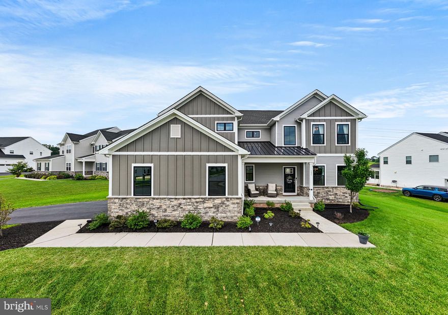 Welcome to 131 Violet Way, a stunning home located in the sought-after Magnolia Reserve community and the award-winning Owen J. Roberts School District. Offering over 3,000 square feet of beautifully designed living space, this home combines luxury finishes, functional layout, and modern convenience—all in one of Chester County’s most desirable locations.

Step into the heart of the home: a gourmet kitchen featuring white quartz countertops, 42-inch soft-close cabinetry, a large center island, sleek subway tile backsplash, and stainless steel appliances. Wide-plank engineered hardwood flooring runs throughout the entire first floor, enhancing the warm and sophisticated atmosphere. The open layout flows effortlessly into a spacious great room, formal dining room, private study, and a bright morning room with a dedicated breakfast nook—ideal for both entertaining and everyday living.

Upstairs, the oak staircase leads to a luxurious primary suite with a tray ceiling, spa-like en-suite bath, and a generous walk-in closet. Three additional spacious bedrooms, a full hall bath, and a second-floor laundry room provide both space and convenience.

Additional features include soaring 9-foot ceilings on both the main level and basement, oversized 12” x 24” tile in all full bathrooms and laundry, a powder room on the main floor, and a side-entry 2-car garage with a private owner’s entrance.

Tech-savvy buyers will love the Connected Home package, offering seamless WiFi coverage and smart home technologies for added ease and efficiency.

This home delivers the perfect balance of space, style, and smart living—an exceptional opportunity in an established, family-friendly neighborhood.