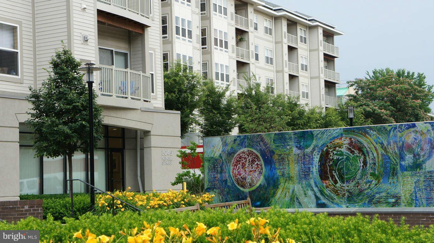 Great second level location with in quiet interior court yard. Enjoy the amenities of Downtown Silver Spring with restaurants, shopping, entertainment, & close to Metro. The unit includes cherry cabinets, large rooms and a beautiful Sun room that can be use as a den. The Sun-room opens to a private patio ideal for recreation and relaxation. Plenty of closet space and washer and dryer inside unit.