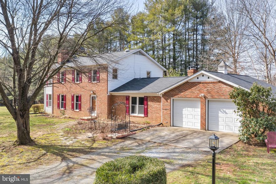 The quiet of the country beckons.  The need for the conveniences of the city calls.   Why not have them both?!  This beautiful 4/3/1 brick home set on 3.05 acres will calm your soul as you enjoy coffee in the sunroom or get creative in the bright craft room with the views of the open space before you.  The kitchen is ready to host with a brand-new microwave & cooktop & additional sink and dishwasher so holiday parties are a breeze as your guests mingle in the dining room or by the fireplace in the front room. You will glide through life on the hardwoods and tile throughout.  The family room has new hardwood just installed  that you will enjoy as you relax by in warmth of the wood stove.  The full bath on the main has a brand-new countertop and the master bath with jetted soaking tub is filled with light to help you wake up and get ready for the day!  You will love the third full bath with the rich granite and glass shower!  No matter what part of the home you are in, daylight always fills your presence with its orientation and especially so with the 3 solar tubes installed with the new roof in 2014.  The flat lot is ideal for your horses that will feel right at home in the two-stall barn with the insulated room above and equipped with an outlet to charge your RV! And when you want to just get some fresh air, relax on the two-tiered deck out back and enjoy the quiet of the country while eating the fresh picked blueberries off of your 3 gin=ant bushes!  Wineries, local fairs and festivals and all the convenience of Leesburg and Purcellville are just a short scenic drive away.  Life is grand at 39530 Rickard Road!  Only 4 driveways off pavement coming from Milltown Rd.