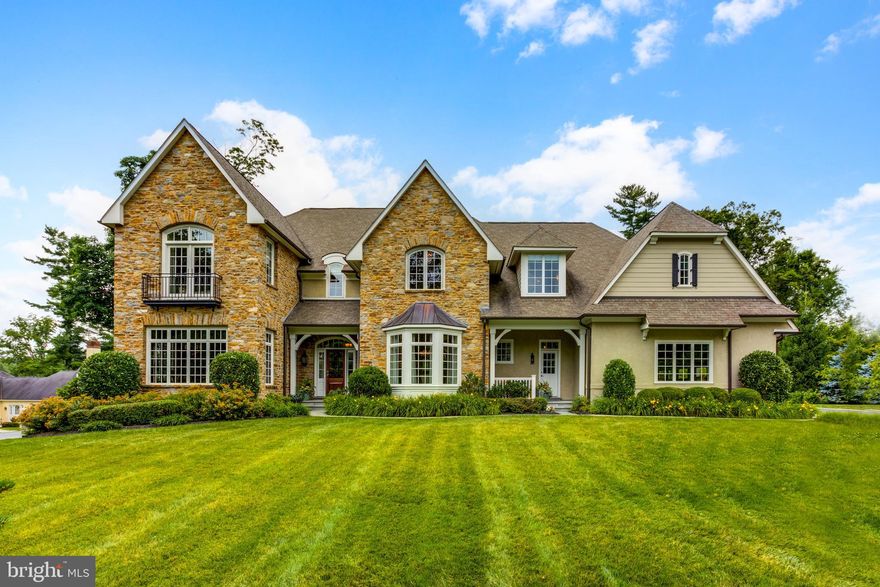 WELCOME TO  ASHWOOD  HALL.  !! An elegant yet comfortable home built by one of Chester County"s most respected builders, Tom Bentley.  It features all the modern conveniences  today"s sophisticated  buyer  expects, yet maintains the charm and beauty of the old world.    The first floor features  a  large, 2 story,  welcoming center foyer overlooking a beautiful curved, front stairway.  It has  an open floor plan with 2 offices ; 2 powder rooms ; a large formal dining with beautiful old world moldings  and a bay window;  an  inviting living room with built in book cases plus a gas fire place.   The gourmet  kitchen features a very large marble island which accommodates 5 - 6 chairs,  plus marble counter tops, 42'  cabinets , along with a wet bar area, double oven, 5  burner gas stove and it  opens  to the comfortable breakfast room with  an outside entrance; and a wonderful size family room with mounted TV,  gas fireplace, beamed ceiling and lots of natural light from all the surrounding windows and glass doors. There is also a "family" front door which leads into the back hall, the 2nd powder room, a  back stairway,  a  coat closet ,  an entrance to the 4 car garage and  a nice walk in pantry,  The hardwood floors  throughout the first floor add to the warmth of this beautiful home.  The second floor features 5 bedrooms, 4 bathrooms plus a laundry room with washer, dryer and laundry sink. Enter the master bedroom through double doors via a cozy sitting room with  a gas fireplace. The master bedroom has a vaulted ceiling, 2 large walk in closets, and a luxurious  bathroom with his and her vanities , a stand alone tub,  water closet, and a large " double" shower with 2 entrances! Three of the other bedrooms have their own baths, while two share a jack and jill bathroom.  The lower level has an additional family room, a wine cellar, a game room , an exercise room, a full bath room, plus a large storage room.  A window egress completes the lower level!  As charming as the inside is, the outside parallels it!!! The professional landscaping and flower beds are in the front of the house, while the lovely flat back yard is open yet surrounded by trees and bushes for privacy.  The outdoor sprinkler system helps maintain the yard. Enjoy a swim in the heated pool, or relax on the surrounding patio,  or laze about on the covered back patio while enjoying the gas fireplace and watching the mounted  TV!  All the outdoor  teak furniture  will stay, for your enjoyment. ( 4 lounge chairs do not convey).  This home is truely a masterpiece of enjoyment. It shows like a model, having been maintained beautifully by the original owners over the past 7 years.  Move in and enjoy.