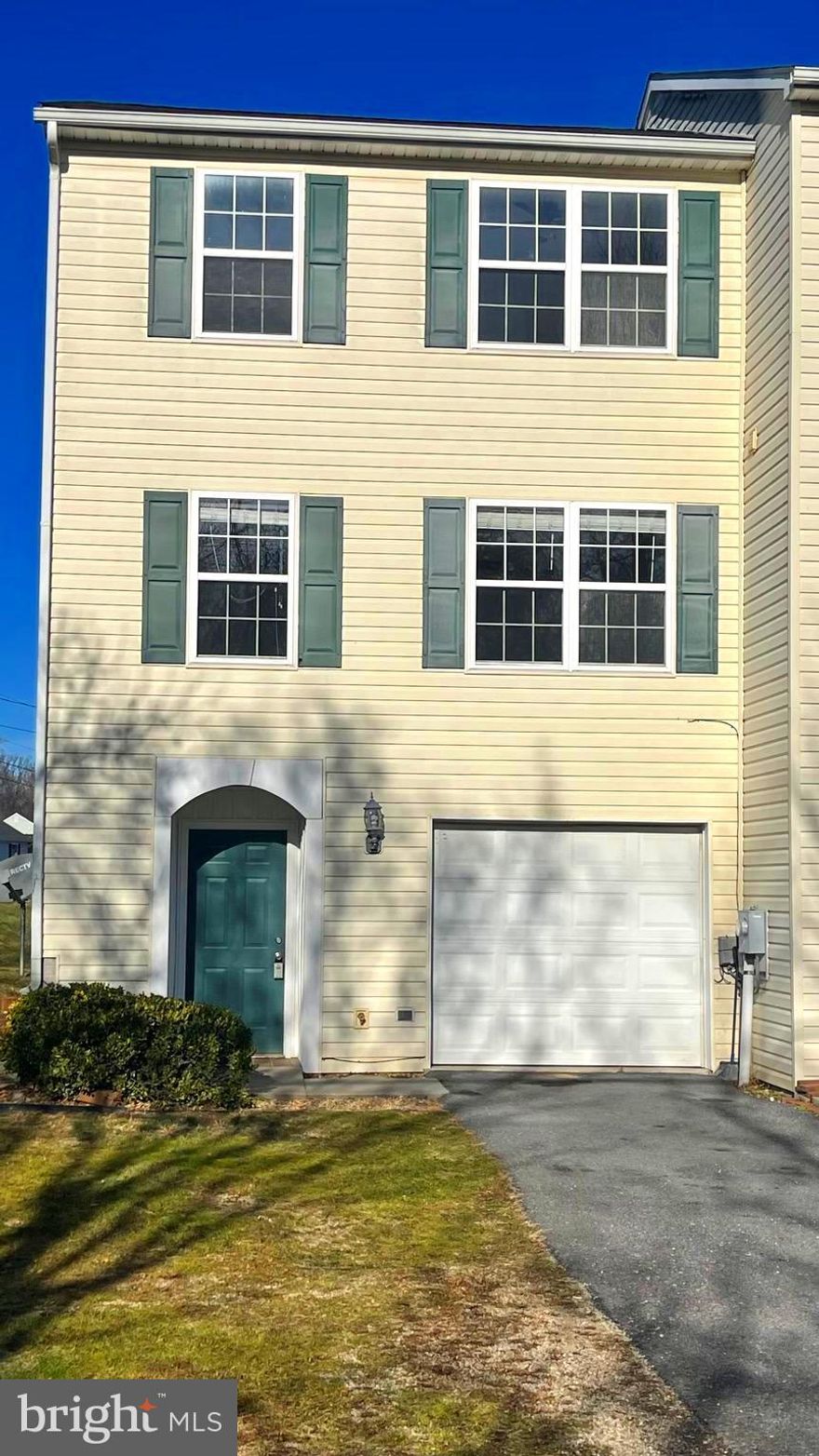 Privacy and comfort abound in this 3 bedroom, 4 bathroom end-unit town home near Inwood, WV.  Being one unit in an only three unit complex with no HOA makes this exceptionally unique.  The .10 acre lot provides more than usual outdoor space when it comes to townhome living.  

On the ground level you find easy to maintain luxury vinyl plank flooring that leads to the one-car garage, the laundry, a half bath and the spacious family room.  A sliding glass door leads to the fenced back yard.  

Follow to carpeted steps to the expansive kitchen/dining/living area with open floor plan and another half bath.  Sliding glass doors off of the kitchen take you onto the large deck, suitable for outdoor recreation.  

On the top level there are three spacious bedrooms.  The primary bedroom has a full bath with shower and two large closets.  The carpeted hallway leads to another full bathroom and two additional bedrooms. 

Call today to schedule your private showing.