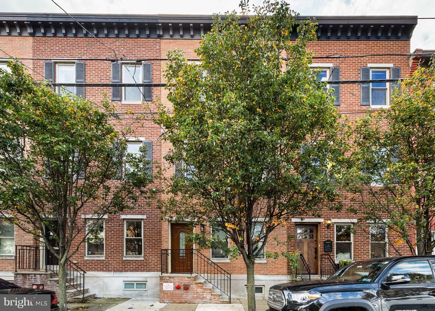 Spacious and bright 3 bedroom, 3 bathroom home with finished basement and roof deck on one of the best blocks in Graduate! Situated on a neighborly block, in the Marian Anderson Neighborhood Academy catchment and with views of Julian Abele Park - you’ll absolutely love this home’s location! With its handsome brick façade, black shutters and detailed cornice, this home has the classic look of a Philly rowhome but the ease of a newer home. Enter the 16’ wide home to a bright, open concept floor plan with gleaming hardwood floors and tall ceilings with recessed lighting. With a floor plan that’s perfect for entertaining, you’ll love hosting friends for the big game, family holidays, or intimate dinner parties. The large kitchen features plenty of flat front espresso cabinetry, granite countertops, stainless steel appliances including built-in microwave and hood, and an off-white textured subway tile backsplash that adds a touch of sophistication. Your friends are sure to gather at the island while looking on as
you create culinary masterpieces! A door leads out to the first of two outdoor spaces – a large patio that is ideal for your grill and a table for dining al fresco. Upstairs you will find two very spacious bedrooms with large closets, as well the shared hall bath with tub and linen closet. The impressive primary suite, located on the 3 rd floor, easily accommodates a king-sized bed with two night stands as well as other furniture. Closet space abounds with two walk-in closets plus another closet as well! The tranquil and light-filled primary bathroom boasts a double vanity, large soaker tub and stand-alone shower. The roof deck boasts stunning, unobstructed views of the skyline, making it the perfect space to unwind with a cocktail or cup of tea. Not to be forgotten is the fully finished basement featuring its own full bathroom, making it the ideal flex space. Use this as a playroom, guest suite, home gym, or office, the possibilities are truly endless. The laundry is also located on this level. An easy commute to CHOP, HUP, or Center City, makes this home’s location ideal for many. You’ll love the convenience of having CVS and Aldi just a stone’s throw away, plus many Graduate favorites like Los Camaradas, Ultimo Coffee, Sidecar Bar, Dock Street Brewery, and so much more, at your fingertips. Freshly painted throughout, this home is ready for its next owner!