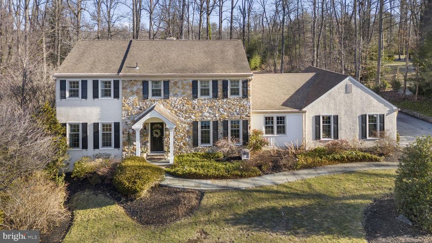 *Offer deadline - all offers due by 5pm Sunday 2/16* Welcome to 807 Llanelly Lane! If you’ve been waiting for a charming and elegant colonial home with character and upgrades galore, this is it! Located on a quiet double cul de sac street in a well-established neighborhood in outstanding Tredyffrin-Easttown School District, this home is ready for its next era. As you make your way up to the front door, you’ll notice the beautiful stone front, mature gardens and trees that create a lovely bucolic setting. Enter the foyer and appreciate the warm hardwood floors extending throughout the whole first floor plus the extensive millwork including wainscoting and crown molding. On your left is the formal living room with recessed lighting and a gas burning fireplace. On your right is the formal dining room leading into the updated eat-in kitchen. The kitchen is a chef’s dream boasting cream-colored cabinets, granite countertops, white subway tile backsplash, stainless-steel appliances and a peninsula breakfast bar with seating for three. The adjacent eating area offers a vaulted ceiling with skylights, a custom built-in wall unit with a beverage refrigerator and glass-front display cabinets, a beautiful view of the expansive backyard and direct access to both the patio and the two-car garage. Conveniently located just off the kitchen is the tiled laundry/mud room that includes an upholstered bench seat, hooks for all your coats and bags, cabinets for storage and a wash sink. Don’t miss the home office with more custom built-ins and plenty of natural light that can be closed off from the kitchen for additional privacy. The cozy den is just a few steps away. With a wood burning fireplace with stone surround and rustic wood mantel, French doors to the patio and a wet bar with a unique copper sink, glass-front display cabinets and a beverage refrigerator, this room is ready to host a party for the next big game! Upstairs, the peaceful primary suite includes a newly renovated private bathroom with a large walk-in closet, tiled accent wall, free-standing soaking tub, double vanity with marble countertop and a cabinet tower for storage plus a step-in shower with tile surround and frameless glass enclosure. The second floor is completed by three additional bright and cheerful bedrooms that share the updated hall bathroom offering a double vanity, step-in shower with tile surround and frameless glass enclosure. The partially finished basement offers additional living space perfect for a playroom, craft room or game room. Additionally, there is unfinished space that can be used for storage, a home gym or a workshop – the workbench is already there! Last but not least, the backyard is just waiting for spring and summer! The large paver patio with a stone half wall leads out into the expansive backyard with mature trees and room to run! There is also a fire pit ready for a bonfire and s’mores. This amazing home is located conveniently just minutes from public transportation, major routes, local shopping and public and private schools including Beaumont Elementary and Episcopal Academy. It’s also walking distance to Hilltop Park! Don’t miss this one!