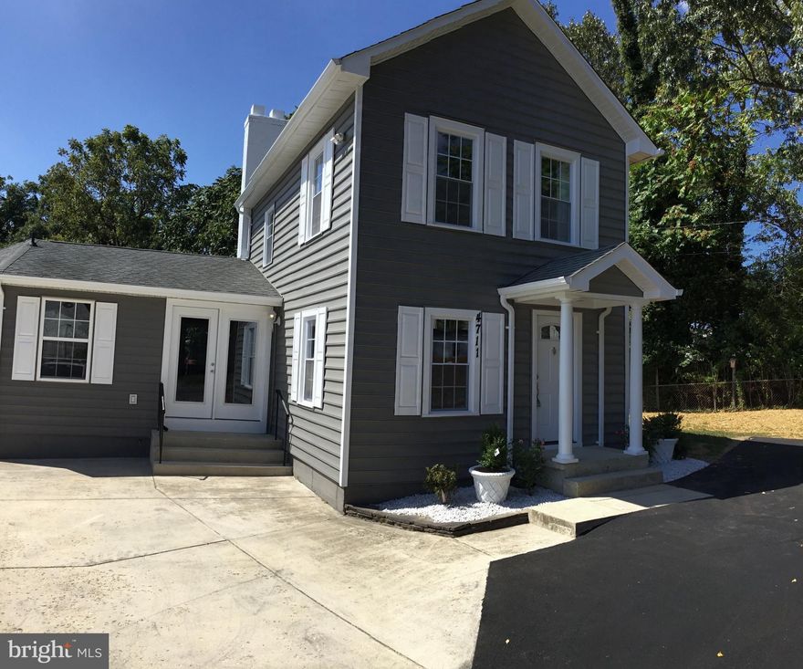 Absolutely stunning!! Remodeled Colonial home in the heart of Beltsville. New kitchen with New stainless appliances, New granite counter and bar top, new backsplash, New white cabinets New engineering hardwood floor on the main and upper & light fixtures!! The 2 bathrooms are remodeled! Interior is freshly painted including the storage room in the basement, Recessed Lights, New windows throughout the house with window treatments, fireplace, New washer and dryer, New Water heater and new one HVAC System Goodman 2.5 Ton. Nice sized lot with asphalt driveway in front of the house and Fence!!  Plenty space for parking Convenient location close to shopping, dining, UMD, major commuter routes, and public transportation. Don't let this one go!!!!