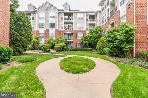 Photo of 4850 Eisenhower Avenue #115, ALEXANDRIA, VA 22304 (MLS # VAAX2065164)