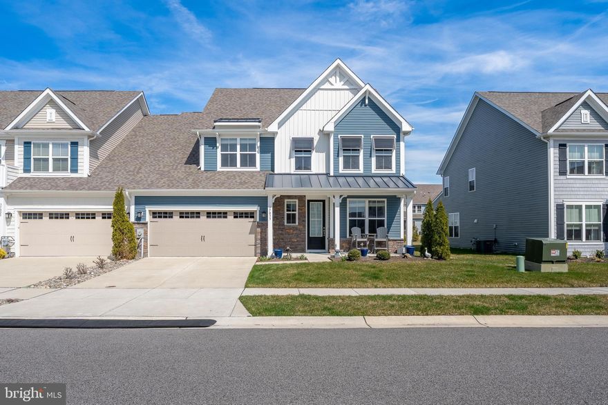 This stunning 4-bedroom, 3.5-bath end-unit townhome is move-in ready and designed for comfort and versatility. The home features two spacious primary bedrooms—one conveniently located on the first floor and another on the second—each with its own private en-suite bath, making it ideal for multi-generational living or hosting guests.
Enjoy additional living space in the bright three-season room, and unwind outdoors on the custom paver patio with a sitting area, perfect for relaxing or entertaining. The desirable end-unit location offers added privacy and natural light throughout.
Located in the sought-after Bishop’s Landing community in Millville, this home is just minutes from beaches, shopping, dining, and more, offering the perfect balance of coastal living and everyday convenience.
Builders 10 Year Structual Warranty has 5 years remaining and is tranferable to  new Owner.
Washer and Dryer hook up only, Cabinets/Bookcases in Front Office do not convey Cabinets in the Garage do not convey.