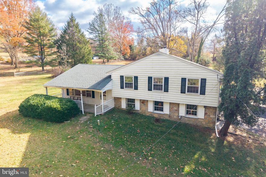 **New Septic System installed** Welcome to Fox Valley in the Garnet Valley School District!
This beautiful 4-bedroom, 2.5-bath single-family home sits on 2.27 acres and offers plenty of space both inside and out. Entering through the side entrance brings you into the main level, where you’ll find the spacious family room—over 400 square feet—featuring a stunning gas-burning stone fireplace. This level also includes a convenient half bath, a utility room with a brand-new tub sink and washer/dryer, and access to the one-car garage. Moving up to the next level, you’ll find the bright living room with newly replaced hardwood floors that flow throughout the main level. Large windows fill the space with natural light. The adjoining dining room connects to the kitchen, which offers plenty of counter space, a generous pantry, and direct access to the backyard. The upper level features four bedrooms, each with ample closet space.  This whole floor has had its wood floors refinished. Three bedrooms share a full bath and a linen closet, while the main bedroom includes two sliding-door closets and a private full bath with a stall shower. One of the bedrooms also provides access to a walk-up attic, which could potentially be finished as a fifth bedroom. Most of the interior has been freshly painted throughout. Outside, you’ll enjoy multiple spaces to relax or entertain—whether it’s the covered front porch or the spacious backyard surrounded by mature trees for added privacy. The property also includes two carports, a walk-in shed, and a long driveway with plenty of parking. Recent updates include a new roof (2020), new heater (2023), partial gutter and plumbing updates, a new power line from the street to the home, fresh paint, and new flooring. This home offers peace and privacy while being just minutes from Routes 1, 322, and 202.