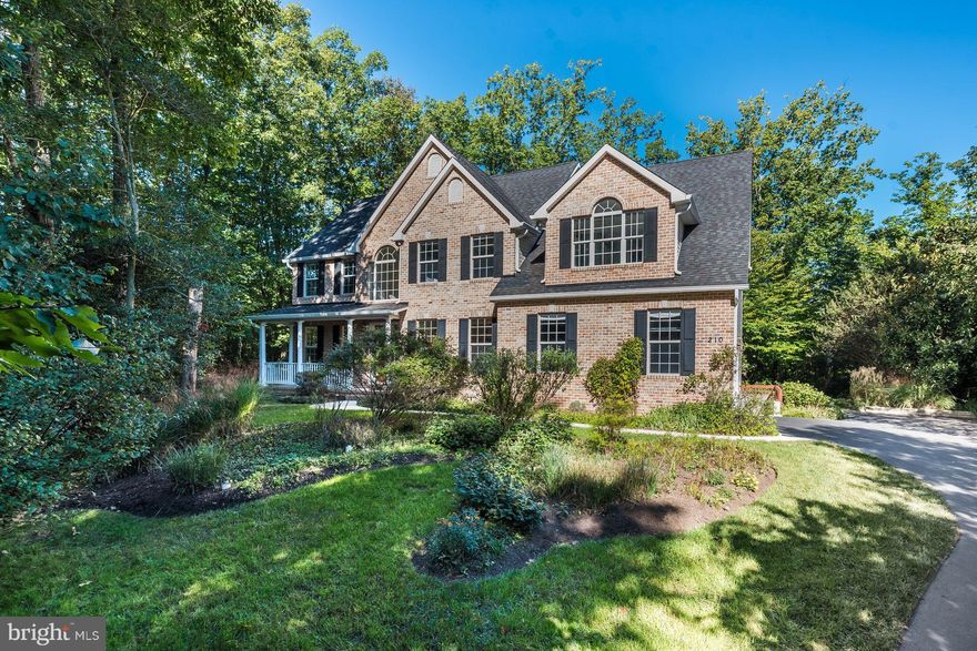 Stunning setting with windows galore, open floor plan with two story foyer accented with archways and columns.  Enormous kitchen, mudroom, main floor office, double closets in master suite. Lower level with Home Theater, Wet Bar, Yoga Studio, Serenity Spa bath and Sauna.  Every room features a special view of nature. One mile to Hospital & Mall . Close to downtown Annapolis. Smart house technology