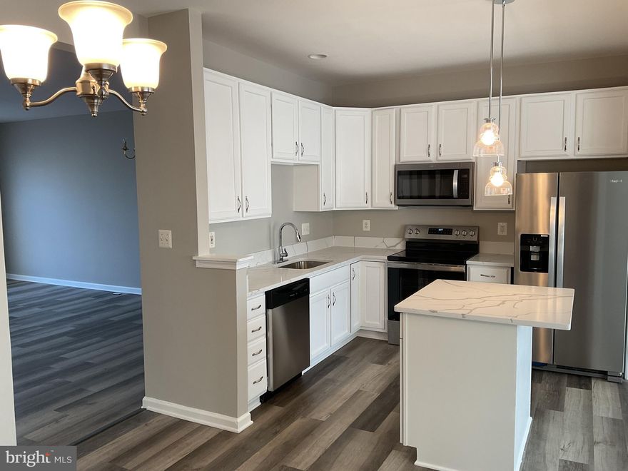 Welcome to this beautifully updated end-unit townhouse in the sought-after Kirkpatrick Farms community! Designed with both style and functionality in mind, this home has been meticulously upgraded and is ready for you to move in.

✨ Key Features:
✅ Gourmet Kitchen with quartz countertops & 42-inch cabinets
✅ Brand-new stainless steel appliances – refrigerator, stove, dishwasher & microwave
✅ Recessed lighting throughout for a modern touch
✅ Open-concept kitchen & family room with a spacious kitchen island
✅ 9-foot ceilings on the main level for an airy feel
✅ Luxury Vinyl Plank (LVP) flooring in the kitchen, family room, & basement
✅ New plush carpet for a cozy ambiance
✅ Fresh paint throughout
✅ Recently replaced HVAC
✅ 1-car garage with storage space


Enjoy all that Kirkpatrick Farms has to offer, including walking trails, community clubhouse, swimming pool, basketball courts, tennis courts parks, playgrounds and top-rated schools. Conveniently located near shopping, dining, and major commuter routes!