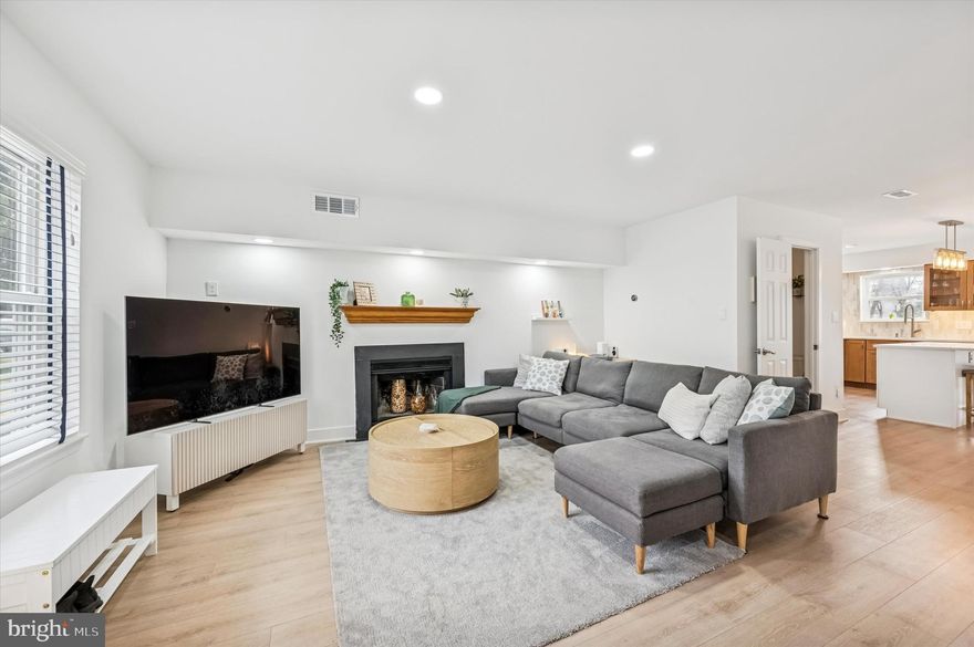 Located in the heart of East Falls, this exceptional end-unit townhome offers an unmatched combination of space, modern upgrades, and rare outdoor living. Two thoughtfully designed additions make this the largest home on the street, while also being tied for the largest yard in the development, complete with direct backyard access, a highly sought-after feature.

The expansive backyard has been beautifully landscaped with custom plantings featuring many native species, a raised garden bed, and a large storage shed, creating a private outdoor retreat ideal for entertaining, gardening, or everyday enjoyment.

Inside, the entire first floor was fully renovated in 2024, including the front entry, kitchen, and bathroom. The stunning kitchen features custom cabinetry, quartz countertops and backsplash, and flows effortlessly into the open living and dining areas. Luxury vinyl flooring was added throughout the first floor, staircases, and second-floor hallway, enhancing both style and durability. Sliding glass doors off the kitchen and walk-out basement were replaced in 2022, filling the home with natural light and improving indoor-outdoor access.

The second level offers a spacious primary suite with custom closets and a private full bath, a generous second bedroom, and an additional renovated full bathroom. The top floor showcases a unique loft space plus a second addition, creating an additional bedroom with skylights—perfect for a home office, guest suite, or flexible living space. A newly replaced heating and cooling system, including the condenser (December 2024), provides year-round comfort and peace of mind.

A walk-out basement offers excellent storage and functionality. Ideally located just two minutes from the train station for an easy commute to Center City and a short stroll to the scenic trails of Kelly Drive, this home is also steps from East Falls’ popular shops, cafés, and restaurants—offering the perfect blend of space, convenience, and neighborhood charm.