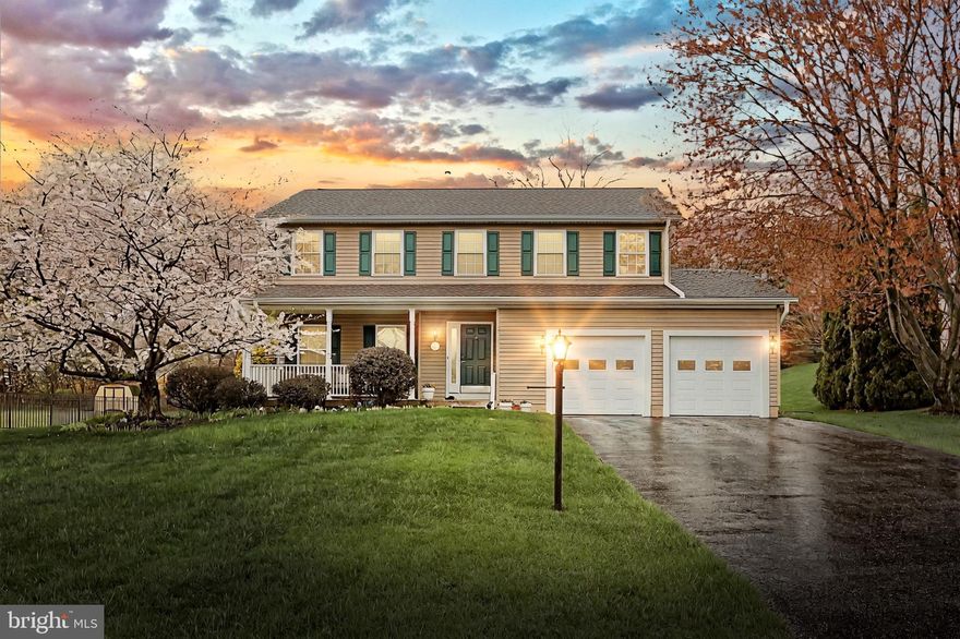 Looking for a home with a first-floor primary suite or separate wing for multi-generational living? This charming, one-owner New Freedom colonial fits the bill! Situated on a level, clear .45-acre lot, this home offers 5 spacious bedrooms, 3-1/2 baths, and an array of thoughtful updates throughout the years.  A welcoming front porch perfect for relaxing frames the main entry. Stepping inside the foyer, ceramic tile floors lead to the powder room and kitchen, with gleaming hardwood floors adorning the rest of the main level. The formal living room and dining room are perfect for entertaining. The cozy eat-in kitchen, updated in 2016 with quartz counters, backsplash and stainless appliances, is conveniently adjacent to the formal spaces, and flows smoothly into the family room. A wonderful composite deck with access from the kitchen is ideal for easy transitions outdoors and warm weather gatherings. French doors open from the family room in the main home to a thoughtfully designed addition built in 2008, perfect as a first floor primary wing or in-law/guest accommodations, featuring a sitting room with kitchenette and private entry opening to the deck, a 19’x10’ bedroom with walk-in closet, full bath with step-in shower, and laundry area with stackable washer and dryer. Upstairs, the oversized primary bedroom boasts large walk-in closet and a beautifully remodeled en-suite bath with shower (2018). Three additional well-sized bedrooms and a full bath complete the upper level, ensuring plenty of private space for everyone. The unfinished basement provides ample storage space and a laundry area with full sized washer and dryer. It’s a blank canvas, offering potential for expansion or a custom recreation area. The attached 2-car garage has a freshly painted floor and ample space for your convenience. Outside, the expansive 0.45-acre lot provides deep front and back yards perfect for gardening, playing, or simply enjoying nature with flowering trees, mature landscaping and a shed for additional storage.
This home has been meticulously maintained and updated, including HVAC (2013), upstairs windows (2013), roof (2015), kitchen counters and appliances (2016), hardwood floors (2017 and 2021), garage doors and opener (2019), Leaf Guard gutters, and water heater (2020), just to name a few. Located in a fantastic neighborhood with easy access to shopping, schools, recreation, and a quick commute to Maryland, this home offers both convenience and comfort. Pride of ownership is evident, and this home is ready to welcome its next residents! Don’t miss out – schedule your showing today!