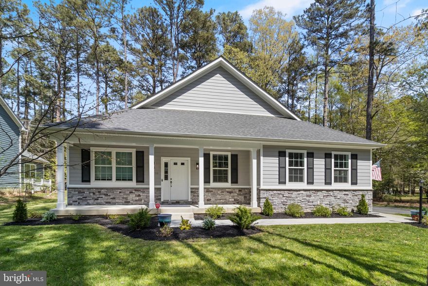 Beautiful custom-built home featuring exceptional craftsmanship and high-end upgrades throughout. The gourmet kitchen is a chef’s dream with Kitchen Aid appliances, a double convection oven, cooktop, oversized island, granite countertops, and a huge walk-in pantry. The spacious family room showcases a stunning coffered ceiling, upgraded trim package, built-in entertainment center, and a gorgeous stone fireplace. Elegant details continue throughout the home with tray ceilings, recessed lighting, and upgraded light fixtures. Each bathroom had granite and tile surrounds for a refined finish. Additional highlights include a convenient wet bar rough-in, coat storage area, and a conditioned crawl space with dehumidifier—perfect for extra storage. Step outside to enjoy the beautiful covered rear porch, ideal for relaxing or entertaining. The builder/owner  with over 40 years of experience  outdid himself on the build. Its a must see!