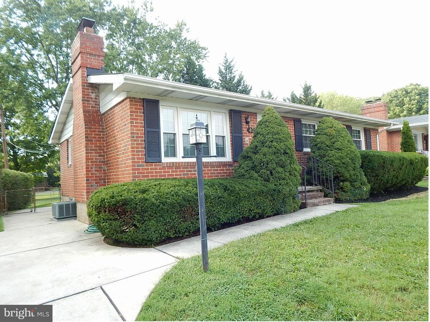 All brick rancher, move in condition. Refinished wood floors, new wall to wall carpet in family room. Desirable gas heat & central air installed '07. New tilt in insulated windows '09. New roof '04. Brick raised hearth fireplace in living room. Huge fully finished lower level family room includes custom built wet bar and recessed LED lights. Convenient to Patapsco State Park & shopping. MUST SEE!