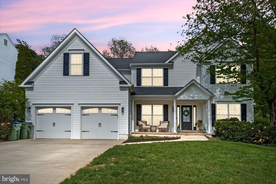 Welcome to this beautiful Colonial in the Hampton Oaks community.  As you enter the 2 story foyer, you are greeted by elegant columns and hardwood floors.  A private convenient home office and large  dining room both welcome you in. The two story family room has amazing natural light, views of the yard, grand staircase to the upper level, fireplace and opens to the gourmet kitchen. The eat-in kitchen is just amazing and includes: a large island, recessed lighting, stainless steel appliances, gas cook top, and best of all a walk-in pantry.   A convenient mudroom with garage access, large, separate laundry room and half bathroom perfects this amazing open floor plan. 

Take the elegant stairway to the second floor with an overlook of the family room The upper level continues the natural light.  The upper level boasts four bedrooms.  The primary bedroom suite has, ceiling fan, two walk-in closets, and double doors to the sitting/reading room.  The updated bathroom has ceramic tile flooring, dual sinks, a frameless walk-in shower with tile flooring, recessed lighting and garden tub.  The additional large sized bedrooms include ceiling fans and great closet space. 
Wait!  There’s more!  The finished basement area includes a cozy bedroom (NTC) and a full bath.  The large rec room has a wet bar and mini kitchen. Upgrades include recessed lighting, walk up stairs to the fantastic yard and tile flooring.  The entertainment area of the space is cozy with plenty of couch space.  For extra storage there is also an unfinished building equipment room.  
Let’s go outside!  The huge 500 square foot composit deck is perfect for entertaining guests or to just relax.  There is plenty of space for grilling and chilling.  The large fenced yard has ample room for activities.  The yard is divided with a wrought iron fence for a separate garden area that has existing raised beds.  

NEW improvements include: 
Entire Kitchen renovation
Completely renovated upper level baths 
50 Year roof replacement 
HVAC and water heater system replacements
Garage and front door replacements
This home is in a perfect neighborhood location because you can walk to the community center, outdoor pool, tennis and pickleball courts, and tot lots. Just a few minutes away from the elementary school, and shopping and dining. A great bonus is the commuting to DCand Pentagon via slug lines,or express commuter buses from VDOT lots a mile from the home.  You are less tan 3 miles away from Quantico Marine Base and the FBI training center.   to DC, Pentagon, and Quantico is very cloWelcome to this beautiful Colonial in the Hampton Oaks community.  Floor plans with dimensions are in the photo section (last ones)