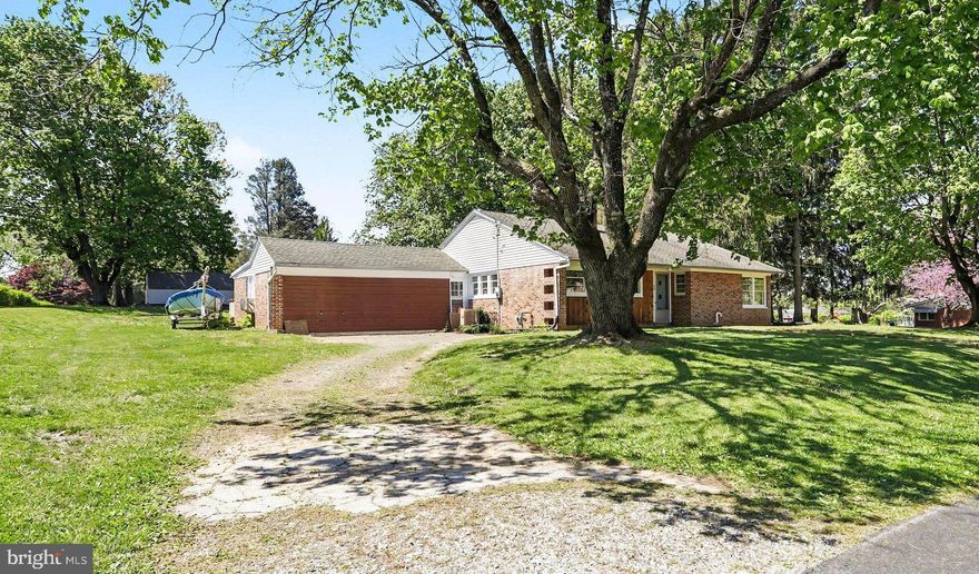 This is a solid rancher on a dead-end street.  Great atmosphere with trees/woods at the end of the road.  Over half acre, flat and usable yard with just the right amount of trees for atmosphere and privacy.   Home features 3 BR and 1.5 BA plus 1st floor laundry.  2-car attached garage.   Galley kitchen with dining room/breakfast nook.  Spacious living room with cozy wood-burning fireplace.  Lots of room in large basement for storage or future finished space.  This home could use some minor cosmetics but you can't beat the space, the 2-car garage and the amazing yard for the price!